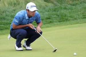 Davis Riley lines up a putt on the fifth green during the first round of the U.S. Open 