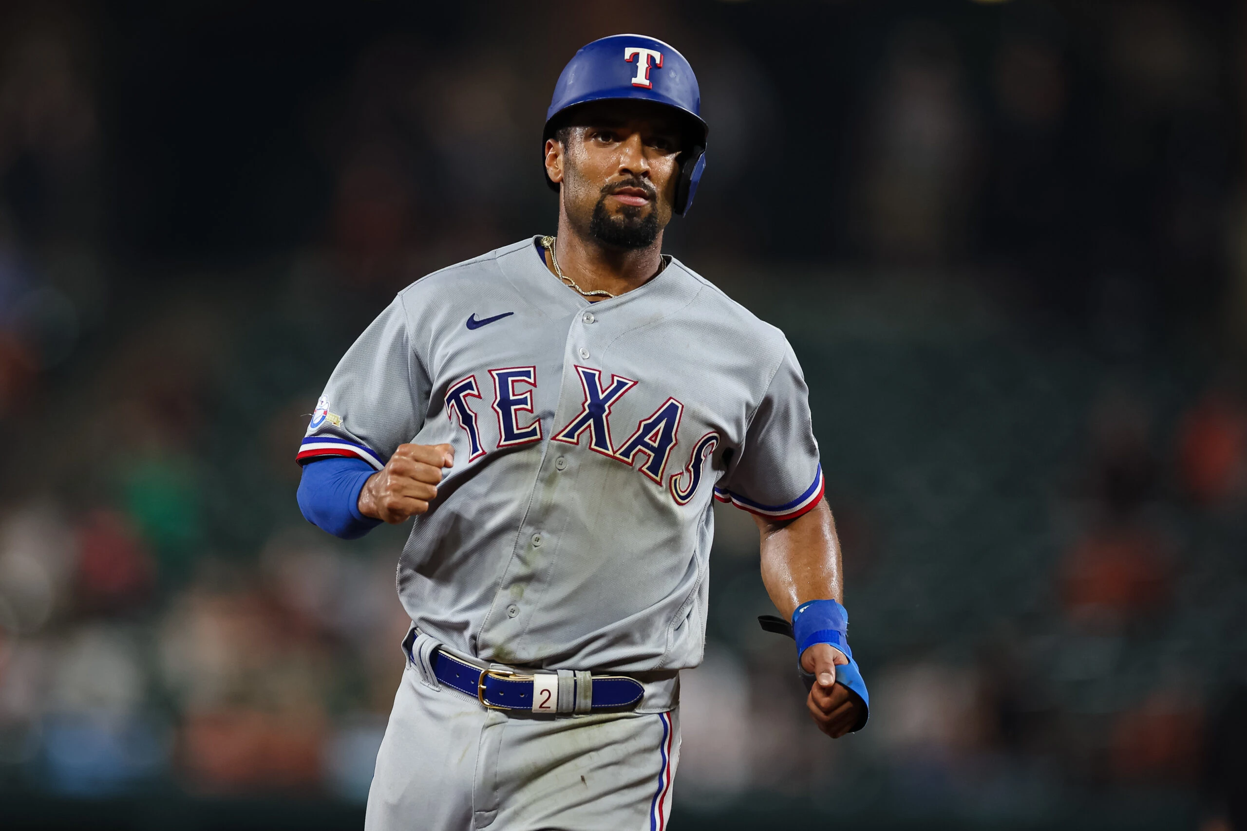 Texas Rangers second baseman Marcus Semien (2) rounds the bases after shortstop Corey Seager (5) hits a two run home run against the Baltimore Orioles during the ninth inning at Oriole Park at Camden Yards.