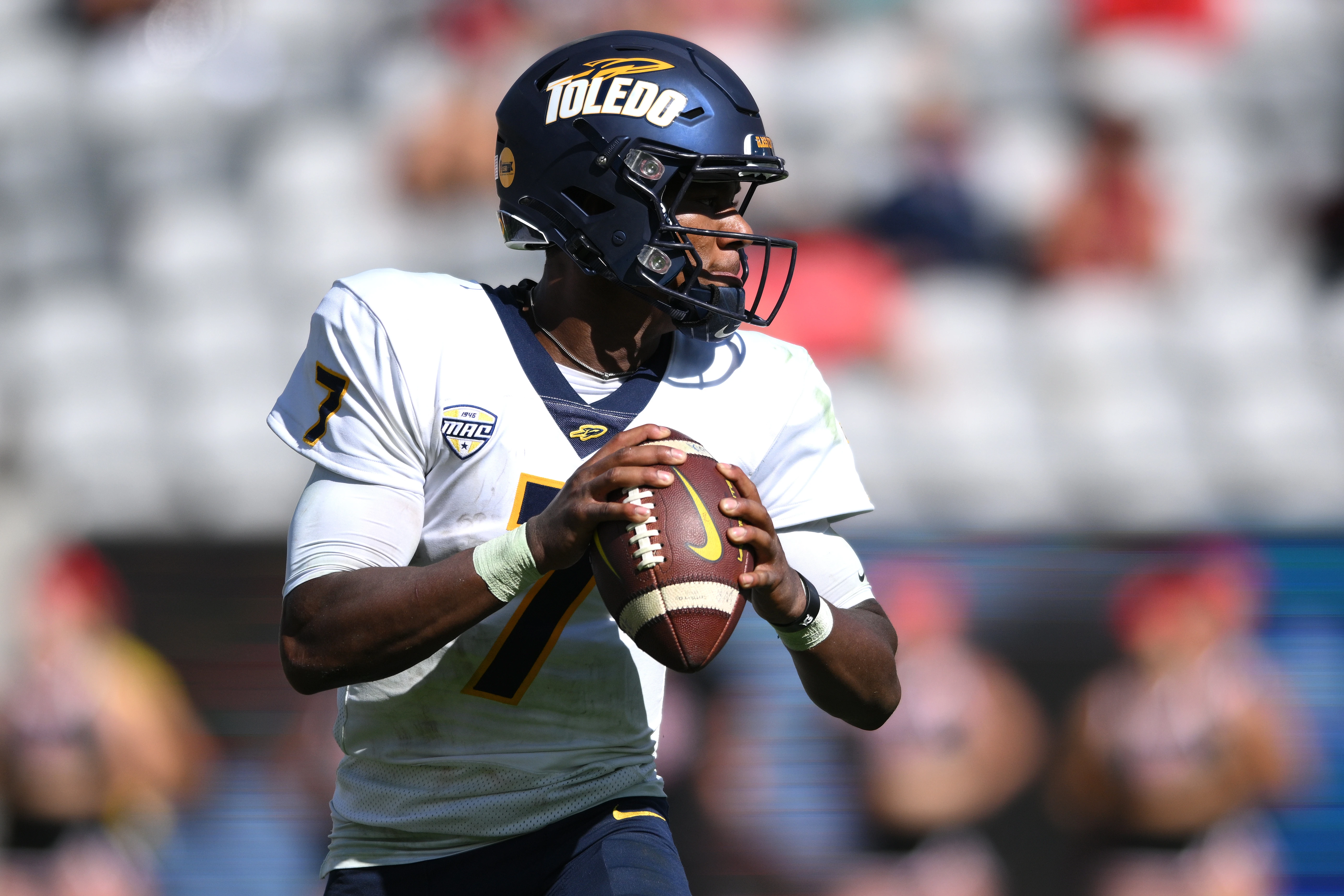 Toledo Rockets quarterback Dequan Finn (7) looks to pass against the San Diego State Aztecs during the second half at Snapdragon Stadium.