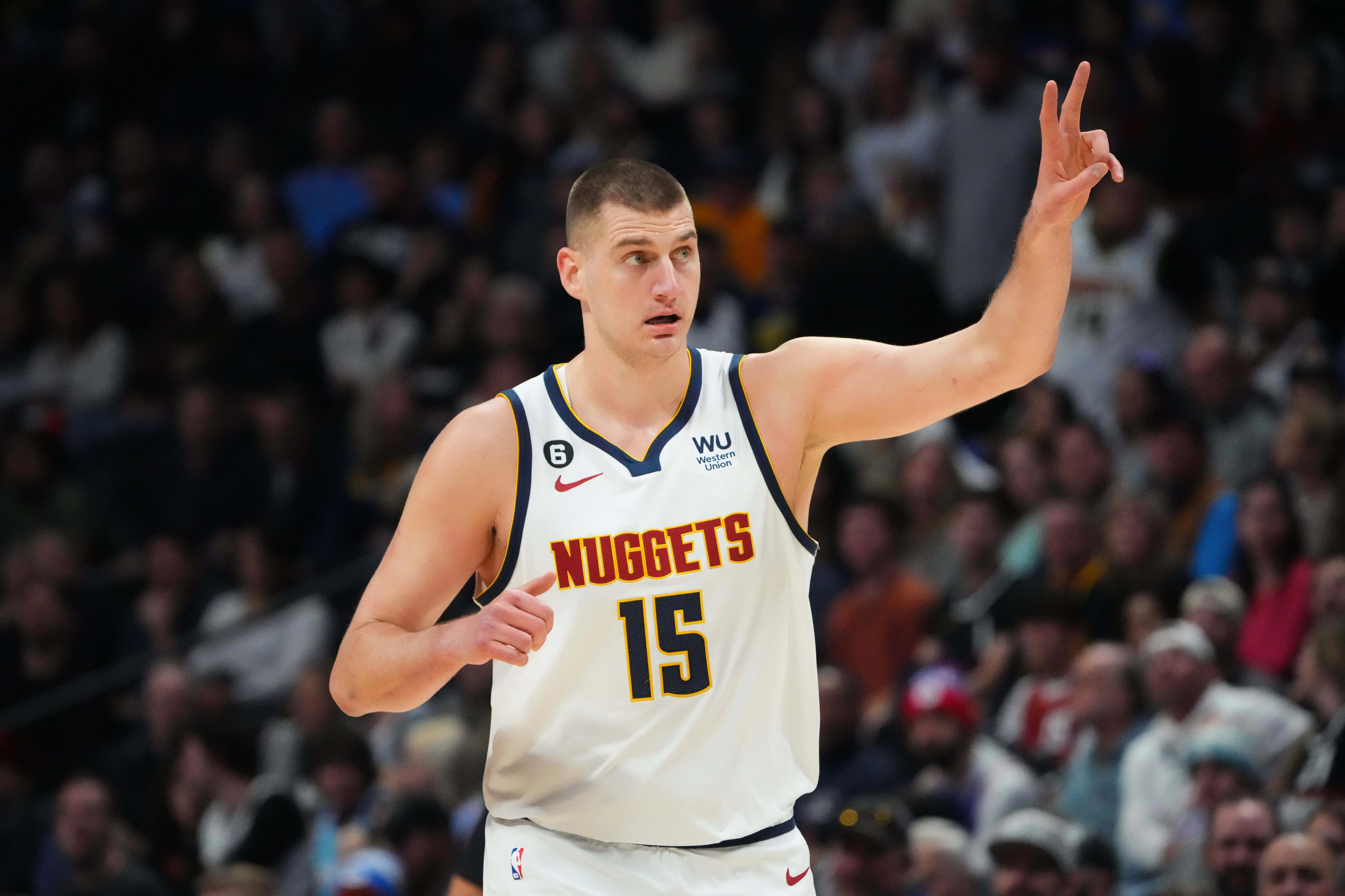 Denver Nuggets center Nikola Jokic (15) calls out in the first quarter against the Miami Heat at Ball Arena.