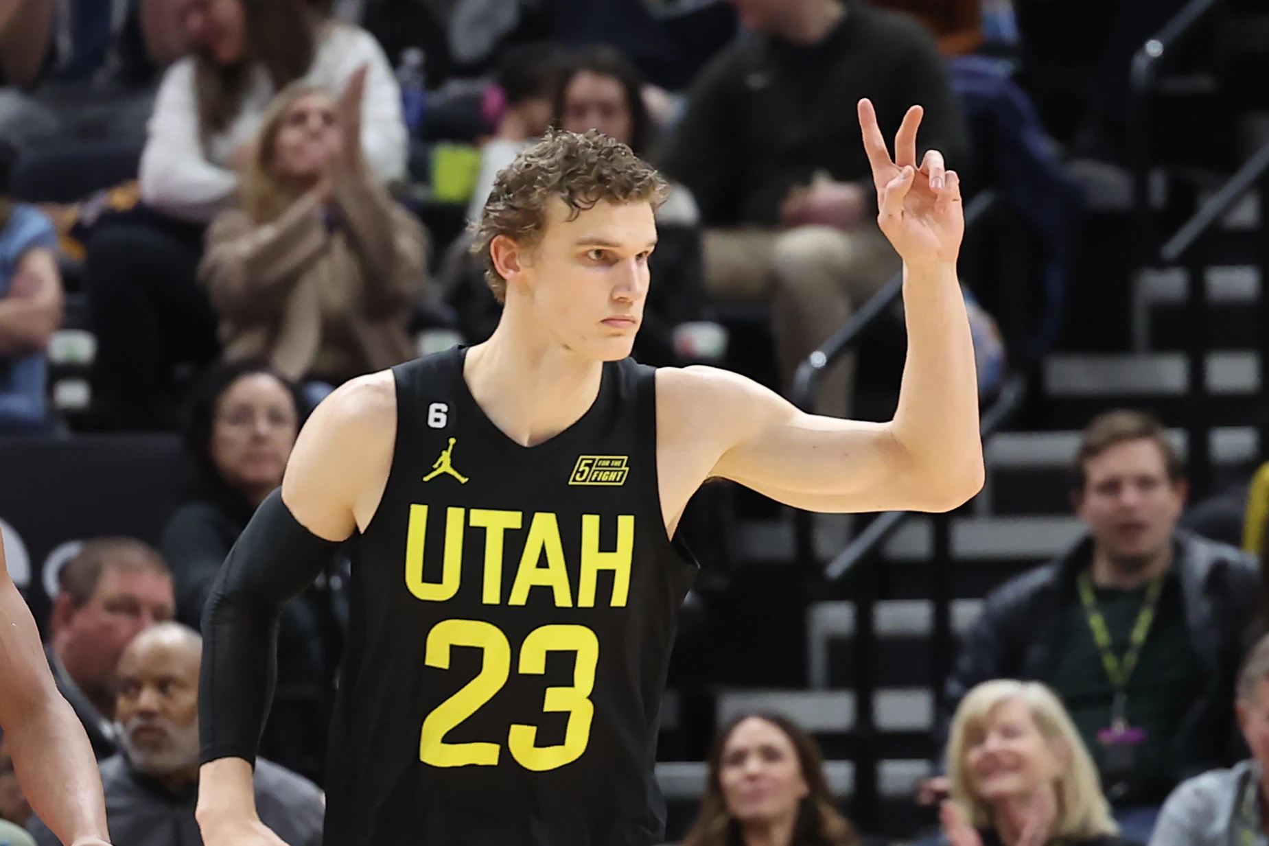 Utah Jazz forward Lauri Markkanen (23) reacts to a play against the Toronto Raptors in the second quarter at Vivint Arena.