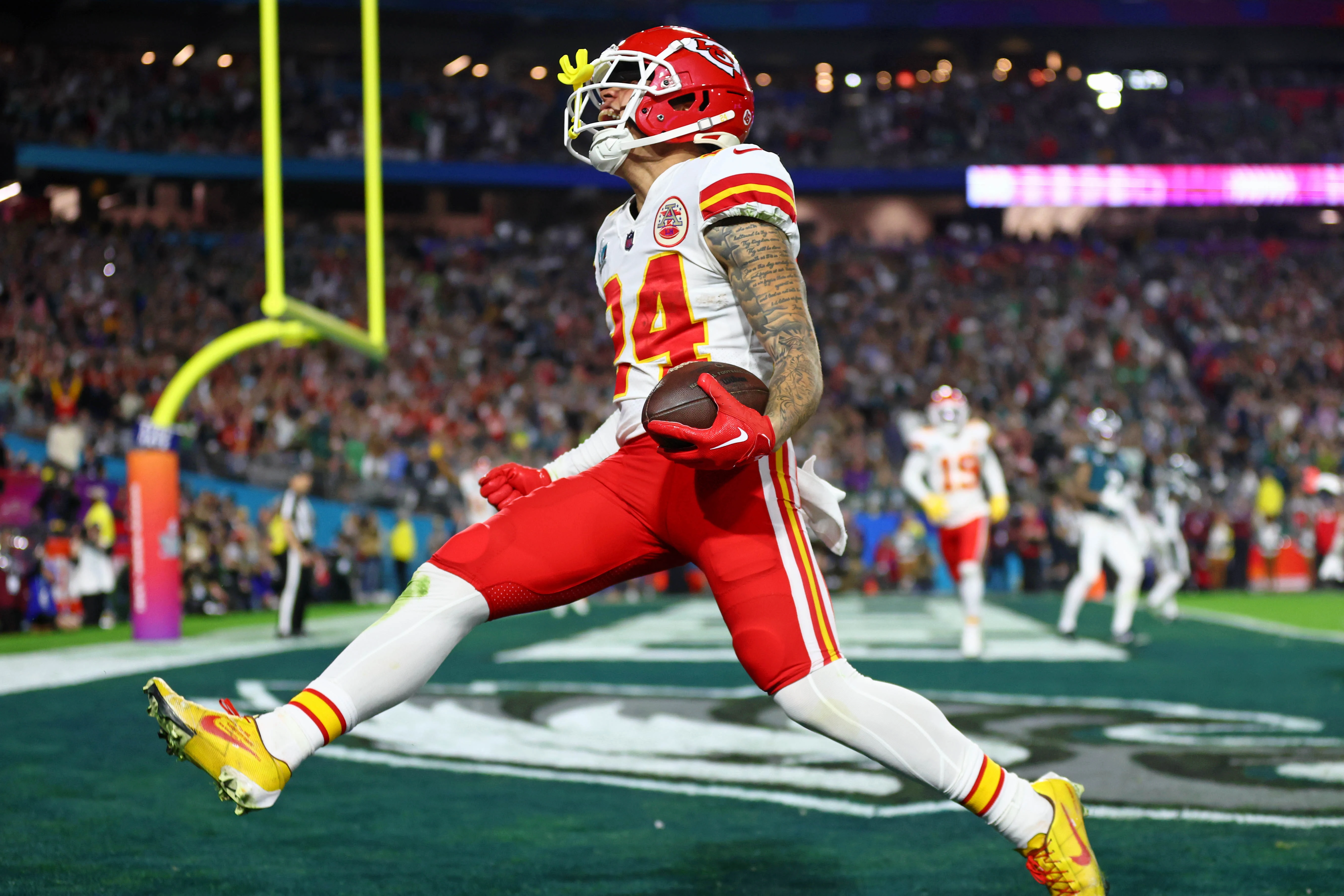 Feb 12, 2023; Glendale, Arizona, US; Kansas City Chiefs wide receiver Skyy Moore (24) celebrates after scoring a touchdown against the Philadelphia Eagles during the fourth quarter of Super Bowl LVII at State Farm Stadium.