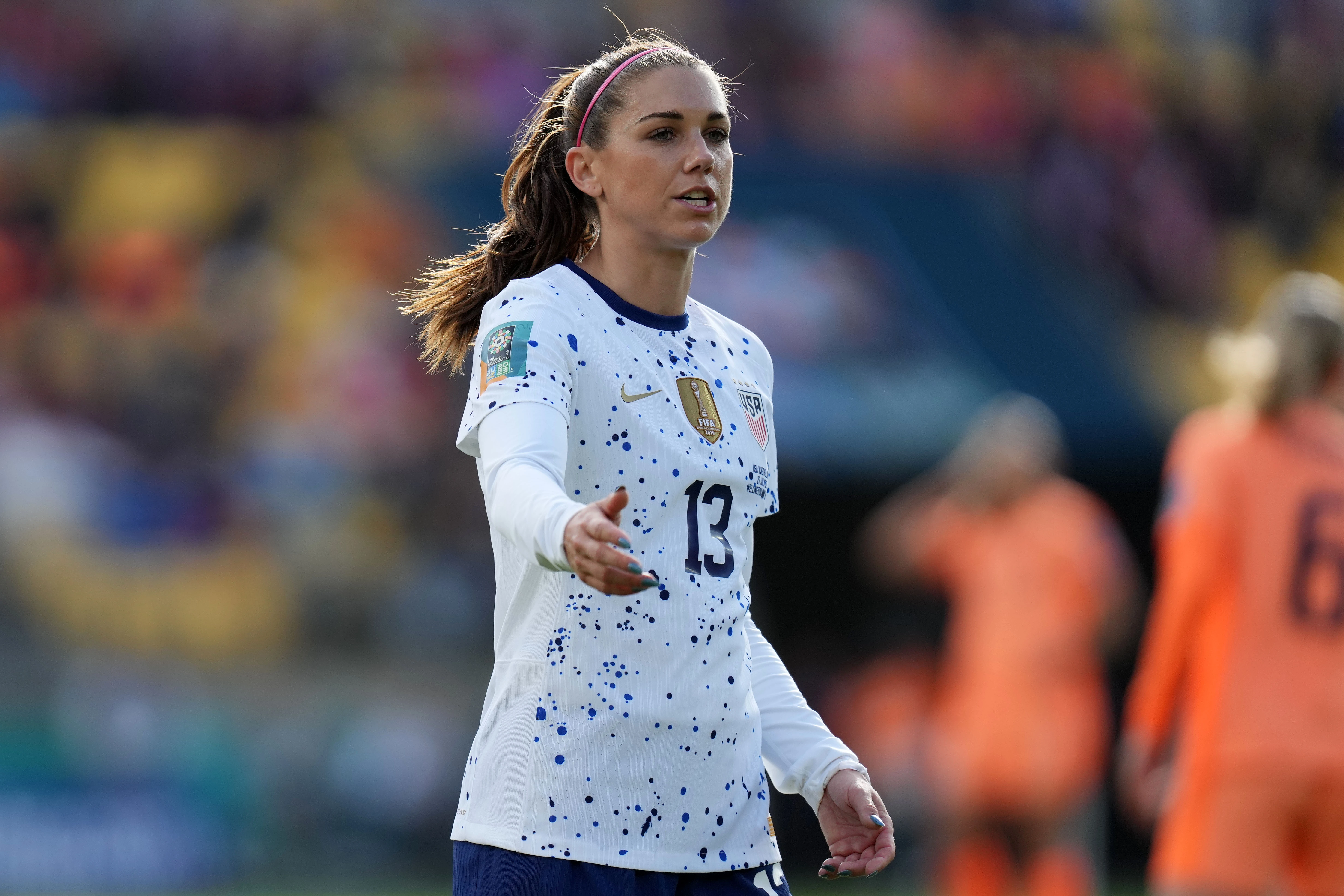 United States forward Alex Morgan (13) reacts against the Netherlands during the first half in a group stage match for the 2023 FIFA Women's World Cup at Wellington Regional Stadium.