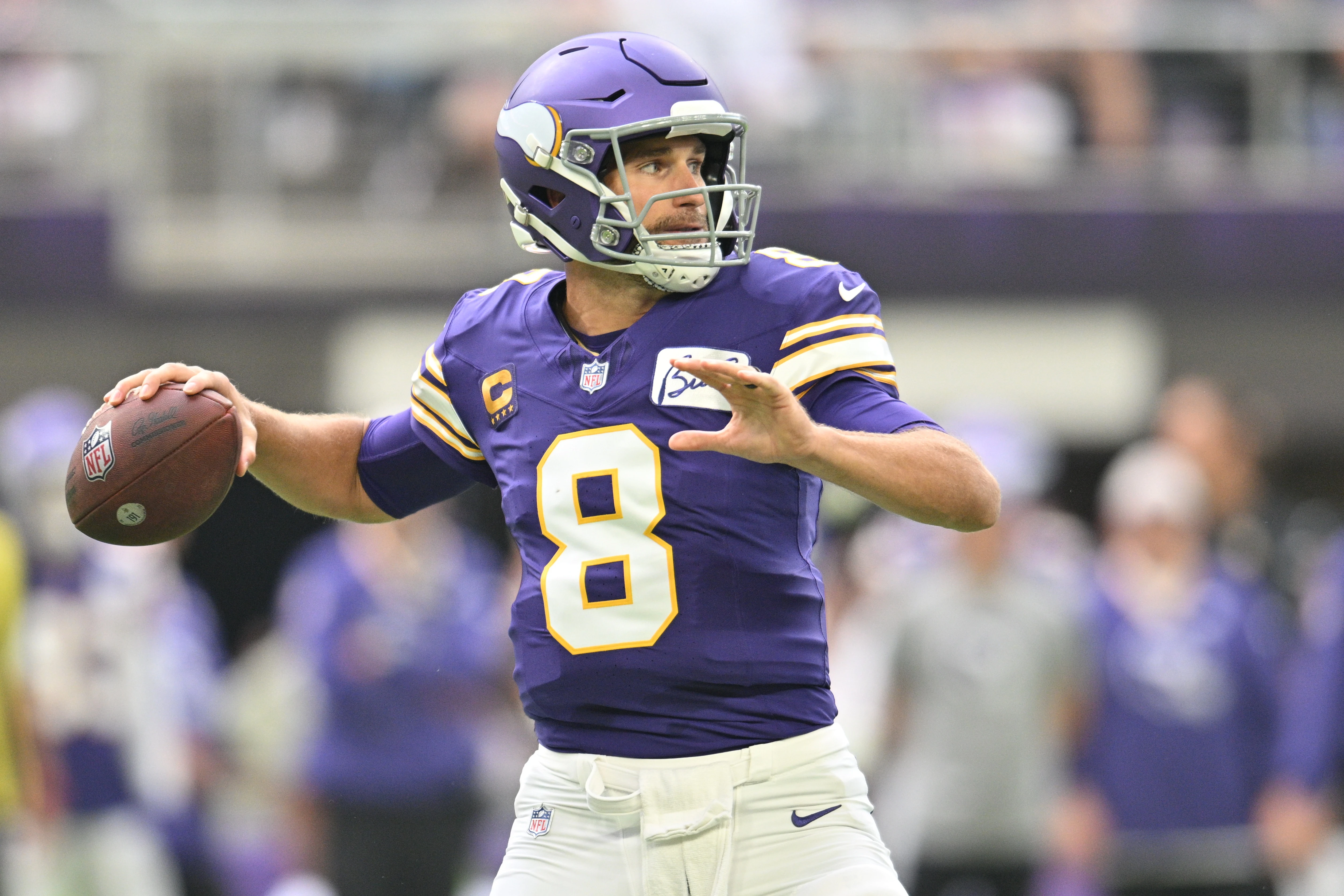 Minnesota Vikings quarterback Kirk Cousins (8) prepares to throw a pass against the Tampa Bay Buccaneers during the first quarter at U.S. Bank Stadium.