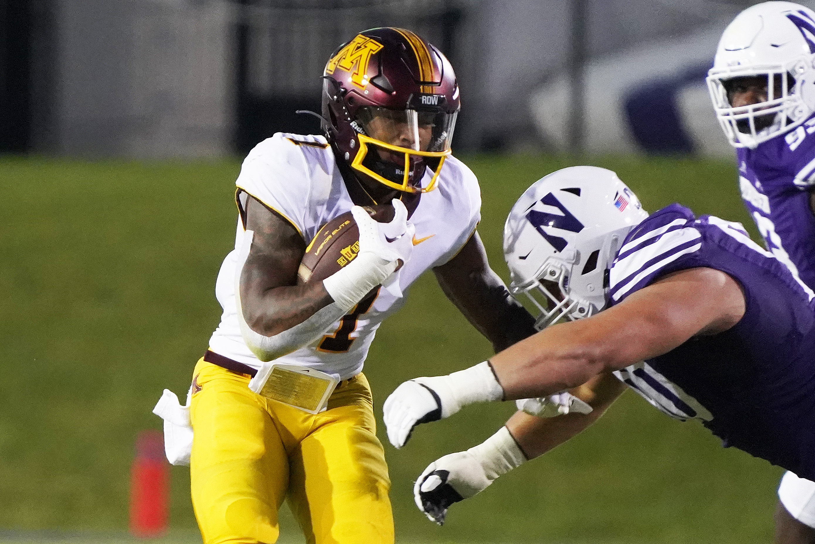 Sep 23, 2023; Evanston, Illinois, USA; Minnesota Golden Gophers running back Darius Taylor (1) runs against the Northwestern Wildcats during the first quarter at Ryan Field.