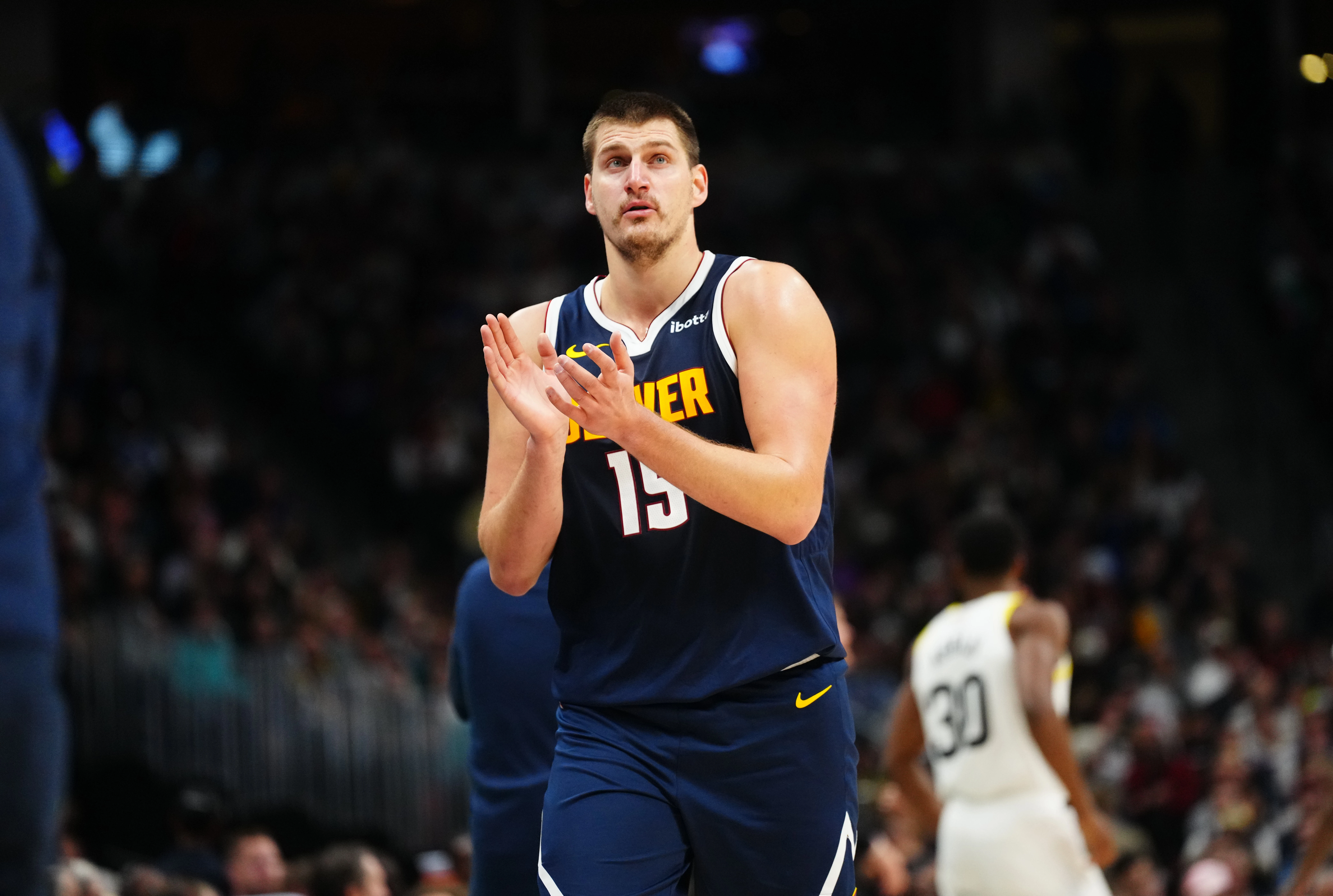 Oct 30, 2023; Denver, Colorado, USA; Denver Nuggets center Nikola Jokic (15) reacts in the third quarter against the Utah Jazz at Ball Arena