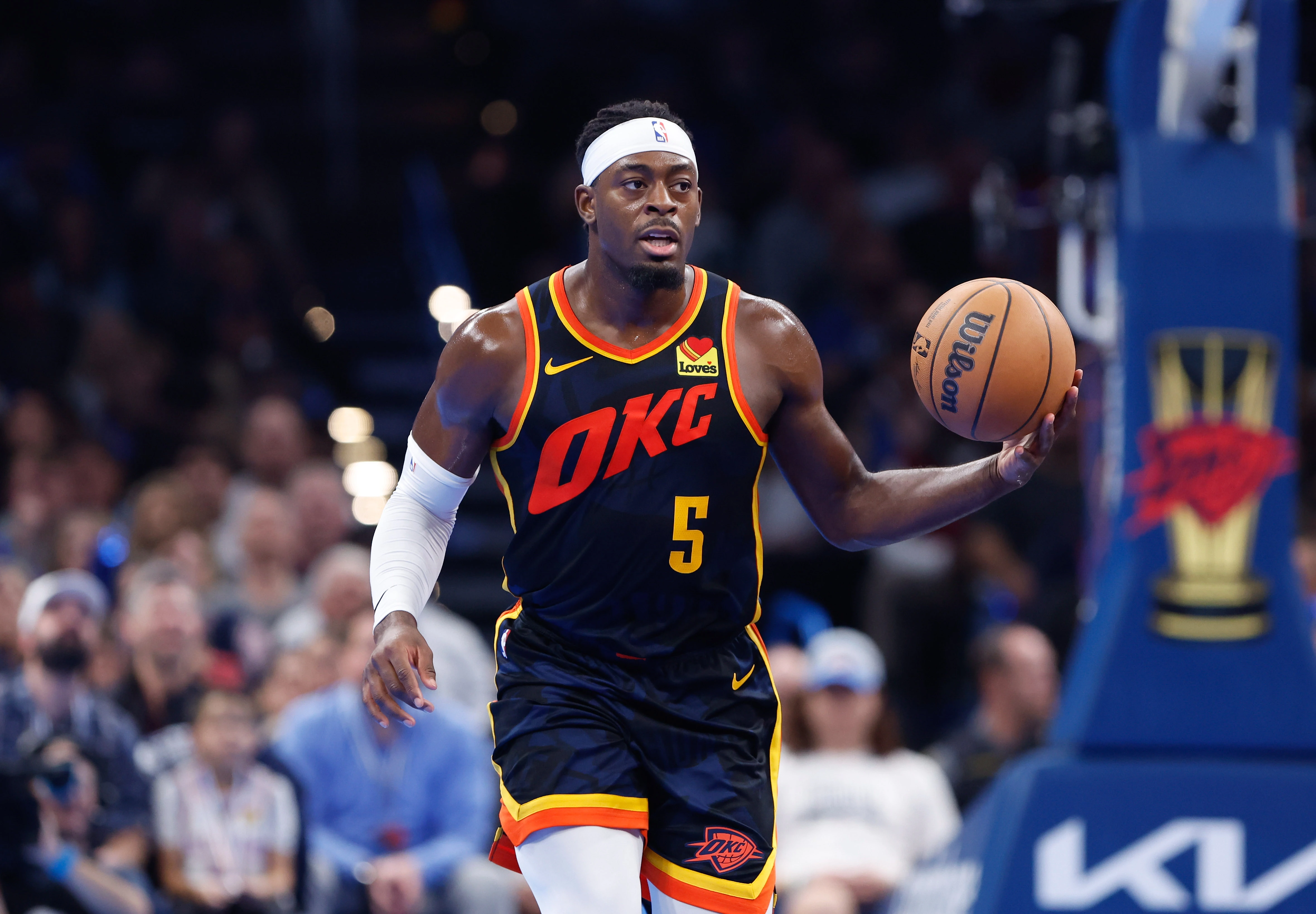 Oklahoma City Thunder guard Luguentz Dort (5) dribbles the ball down the court during the second half against the San Antonio Spurs at Paycom Center.