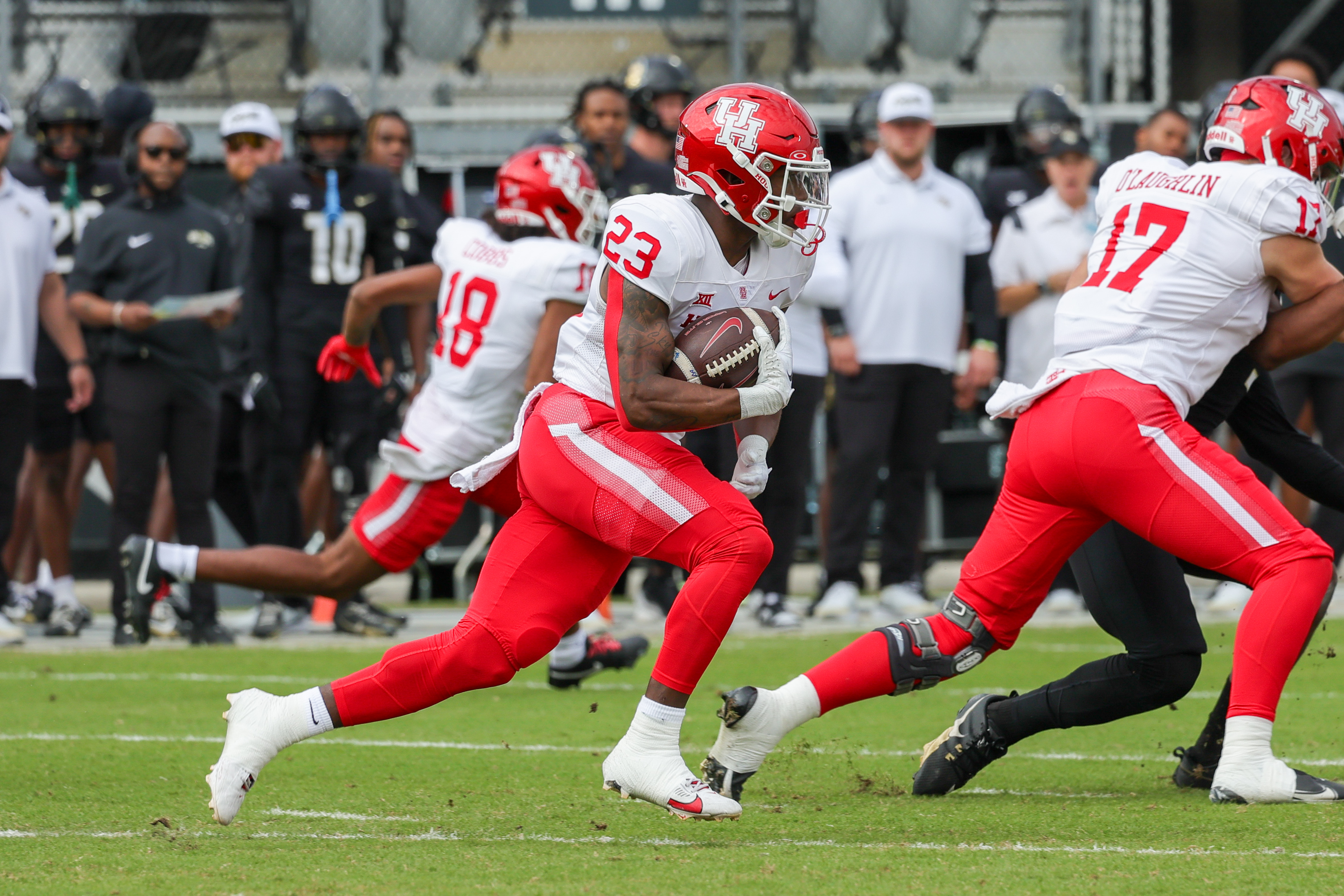 Nov 25, 2023; Orlando, Florida, USA; Houston Cougars running back Parker Jenkins (23) carries the ball during the first quarter against the UCF Knights at FBC Mortgage Stadium.