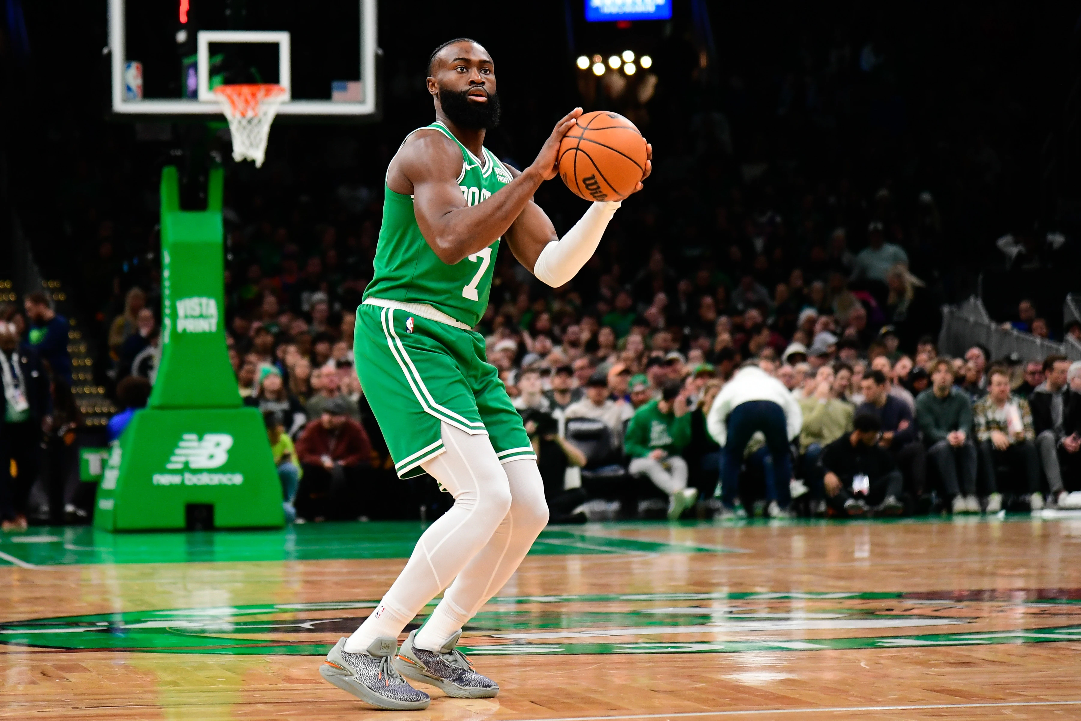 Dec 8, 2023; Boston, Massachusetts, USA; Boston Celtics guard Jaylen Brown (7) shoots the ball during the first half against the New York Knicks at TD Garden.