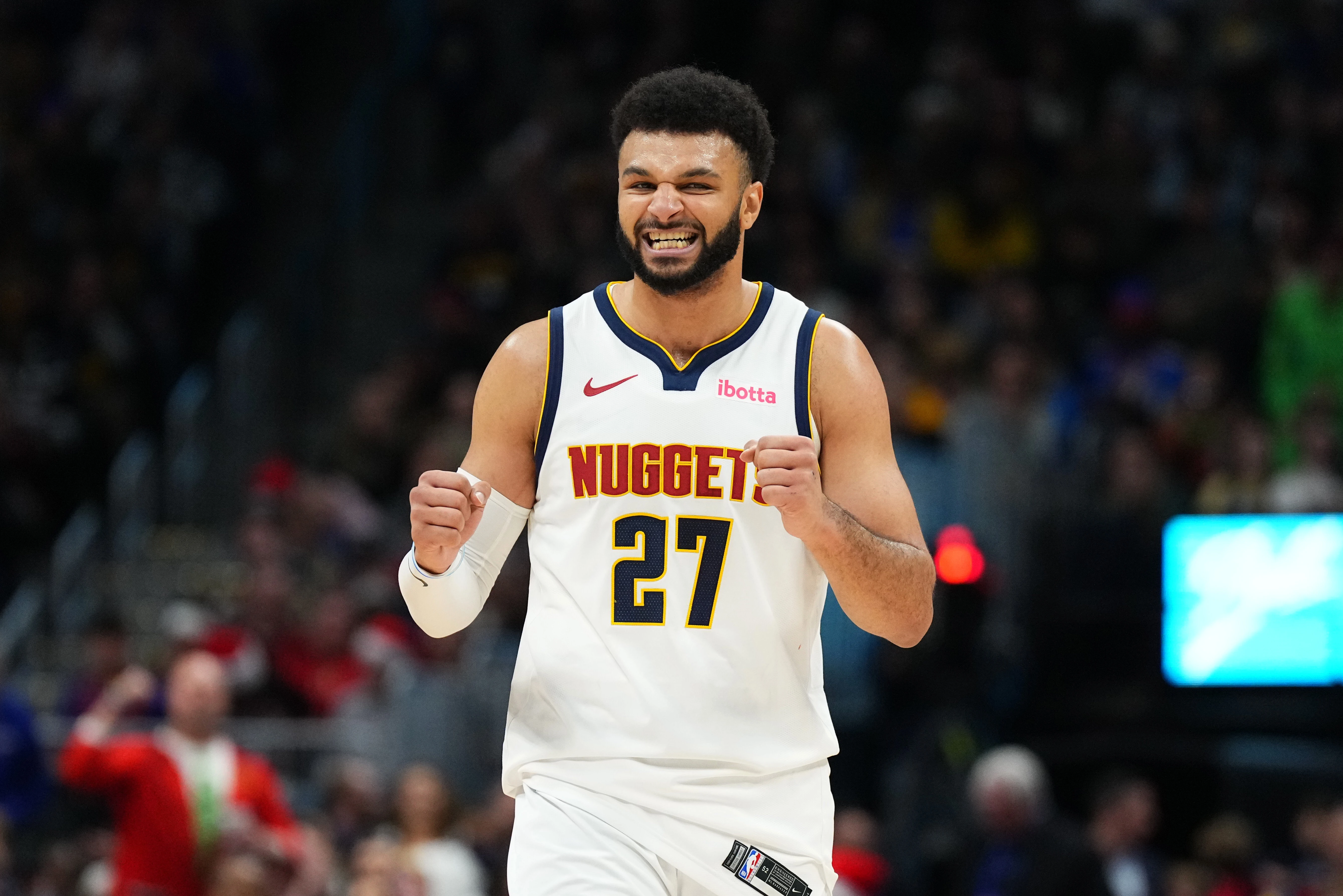 Dec 25, 2023; Denver, Colorado, USA; Denver Nuggets guard Jamal Murray (27) reacts in the fourth quarter against the Golden State Warriors at Ball Arena.