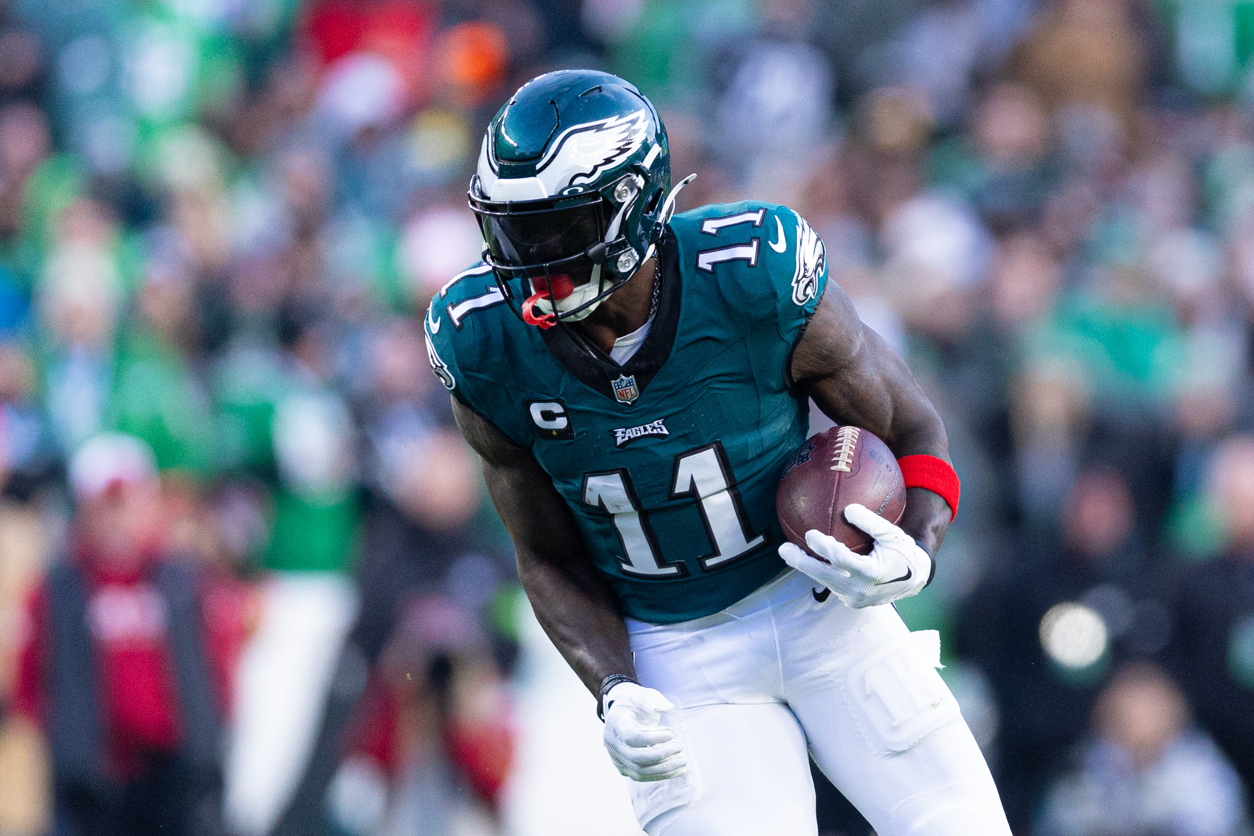 Dec 31, 2023; Philadelphia, Pennsylvania, USA; Philadelphia Eagles wide receiver A.J. Brown (11) runs with the ball during the fourth quarter against the Arizona Cardinals at Lincoln Financial Field.