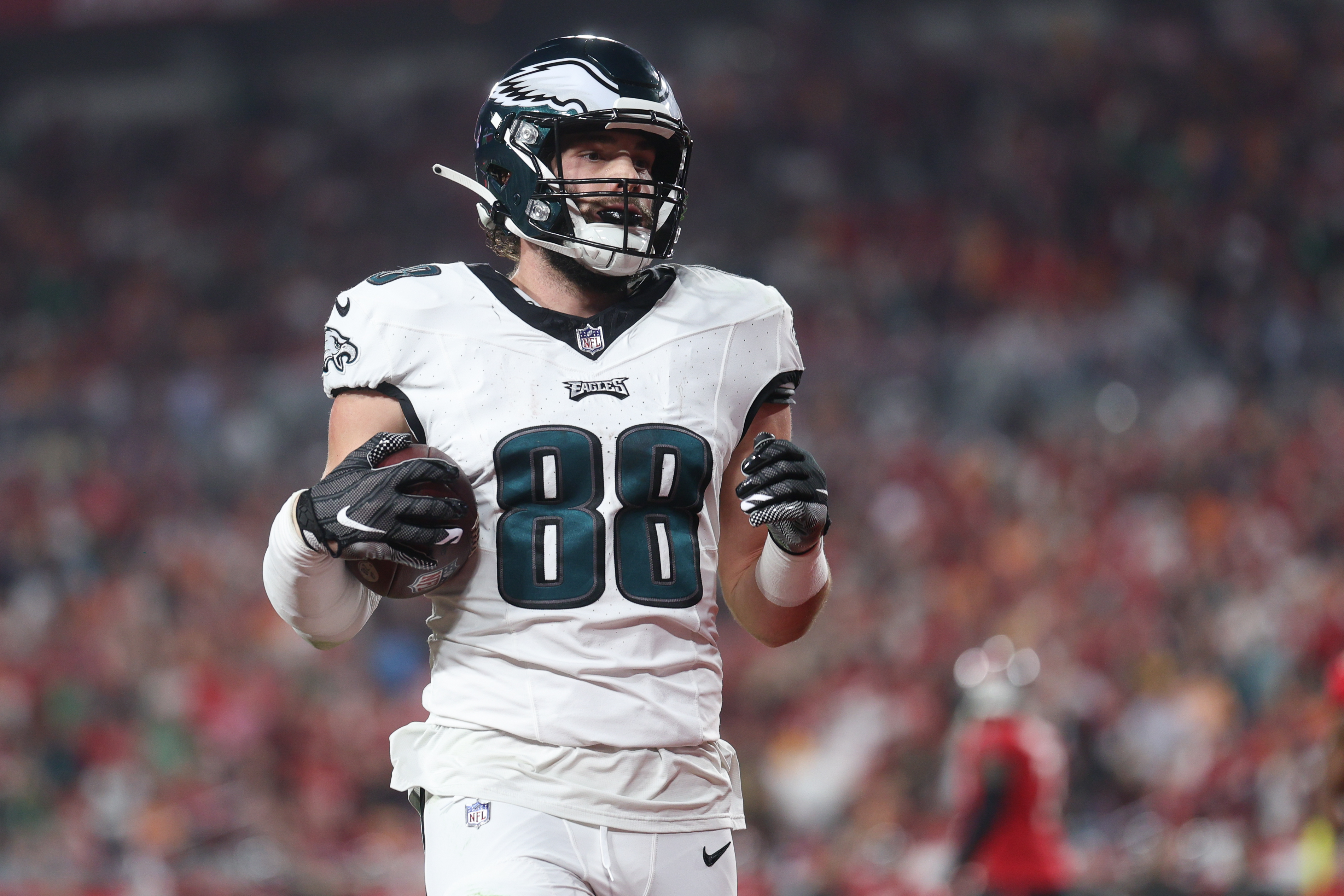 Jan 15, 2024; Tampa, Florida, USA; Philadelphia Eagles tight end Dallas Goedert (88) scores a touchdown against the Tampa Bay Buccaneers after a reception during the first half of a 2024 NFC wild card game at Raymond James Stadium.