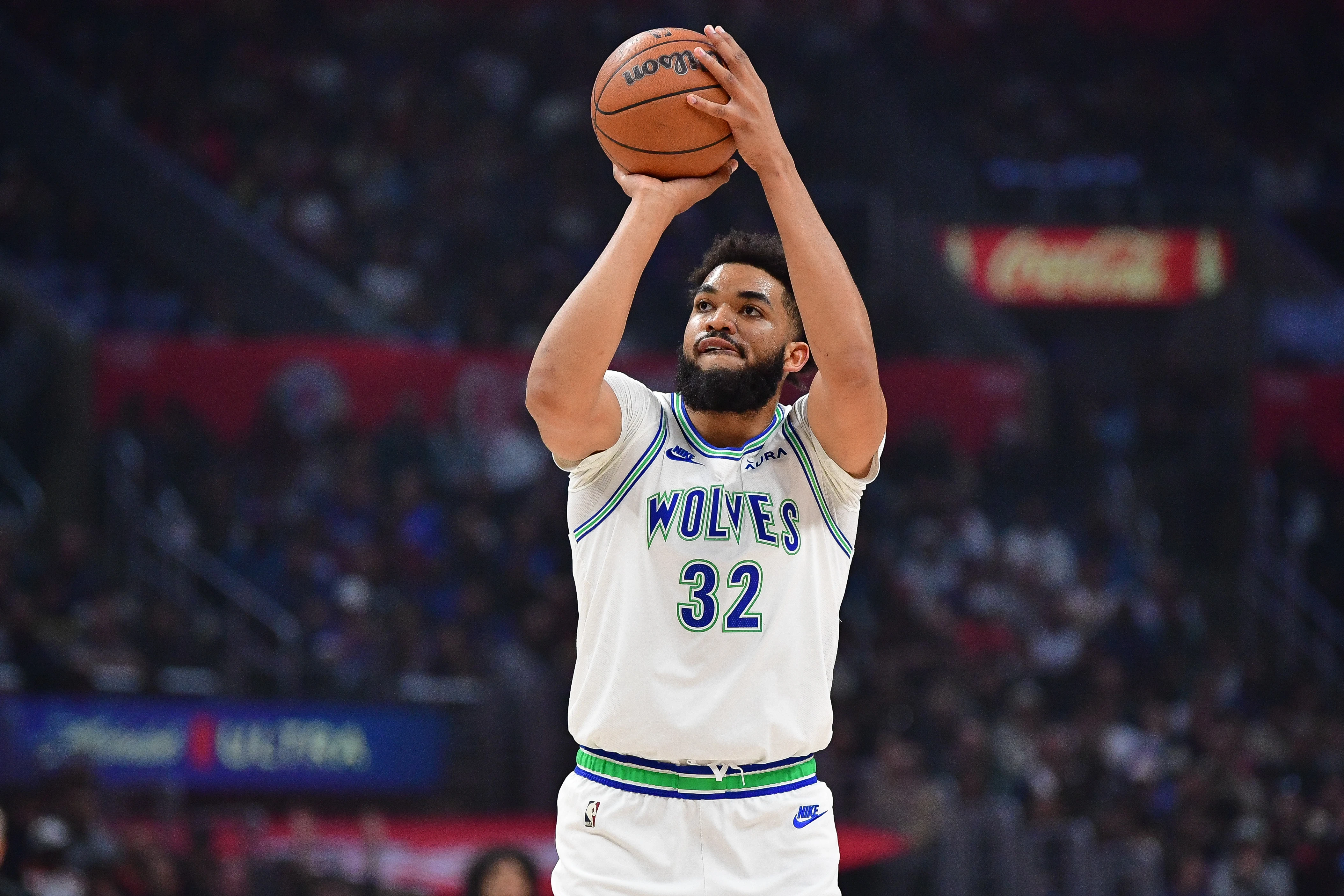 Minnesota Timberwolves center Karl-Anthony Towns (32) shoots against the Los Angeles Clippers during the first half at Crypto.com Arena.