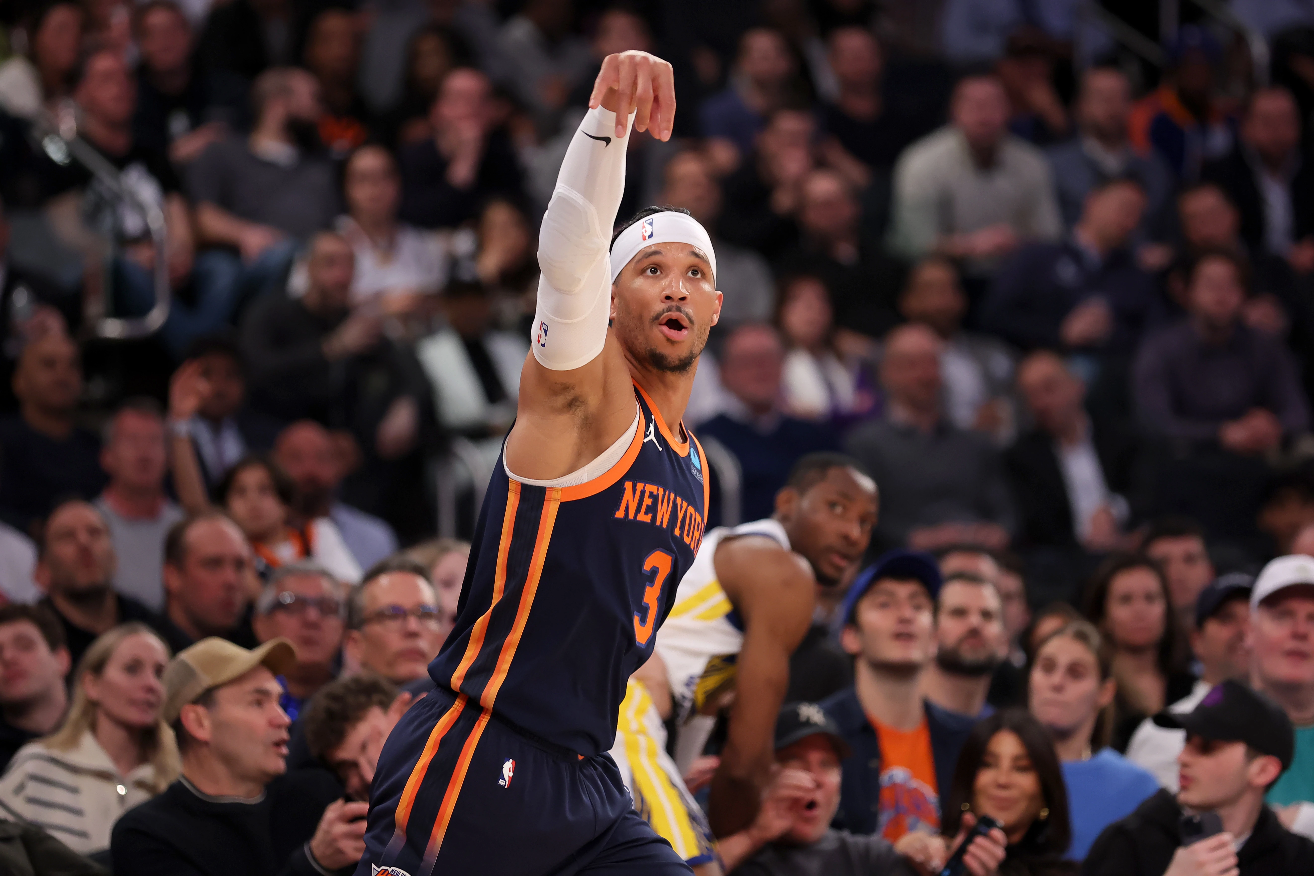 Feb 29, 2024; New York, New York, USA; New York Knicks guard Josh Hart (3) watches his three point shot against the Golden State Warriors during the first quarter at Madison Square Garden.