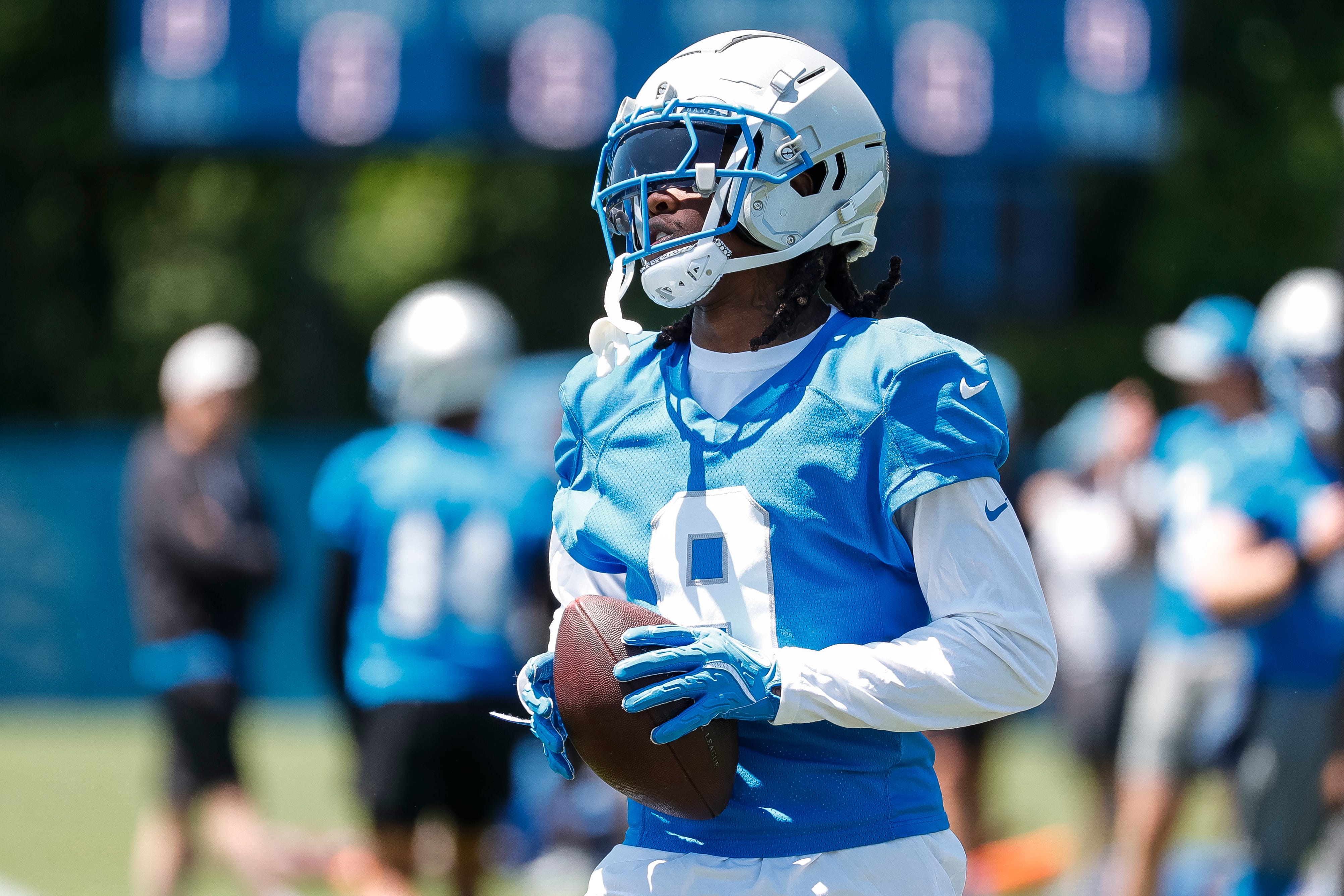 Detroit Lions wide receiver Jameson Williams (9) practices during OTAs at Detroit Lions headquarters and training facility in Allen Park on Thursday, May 30, 2024.