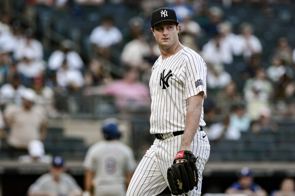 Aug 10, 2024; Bronx, New York, USA; New York Yankees pitcher Gerrit Cole (45) walks to the dugout after the fourth inning against the Texas Rangers at Yankee Stadium.