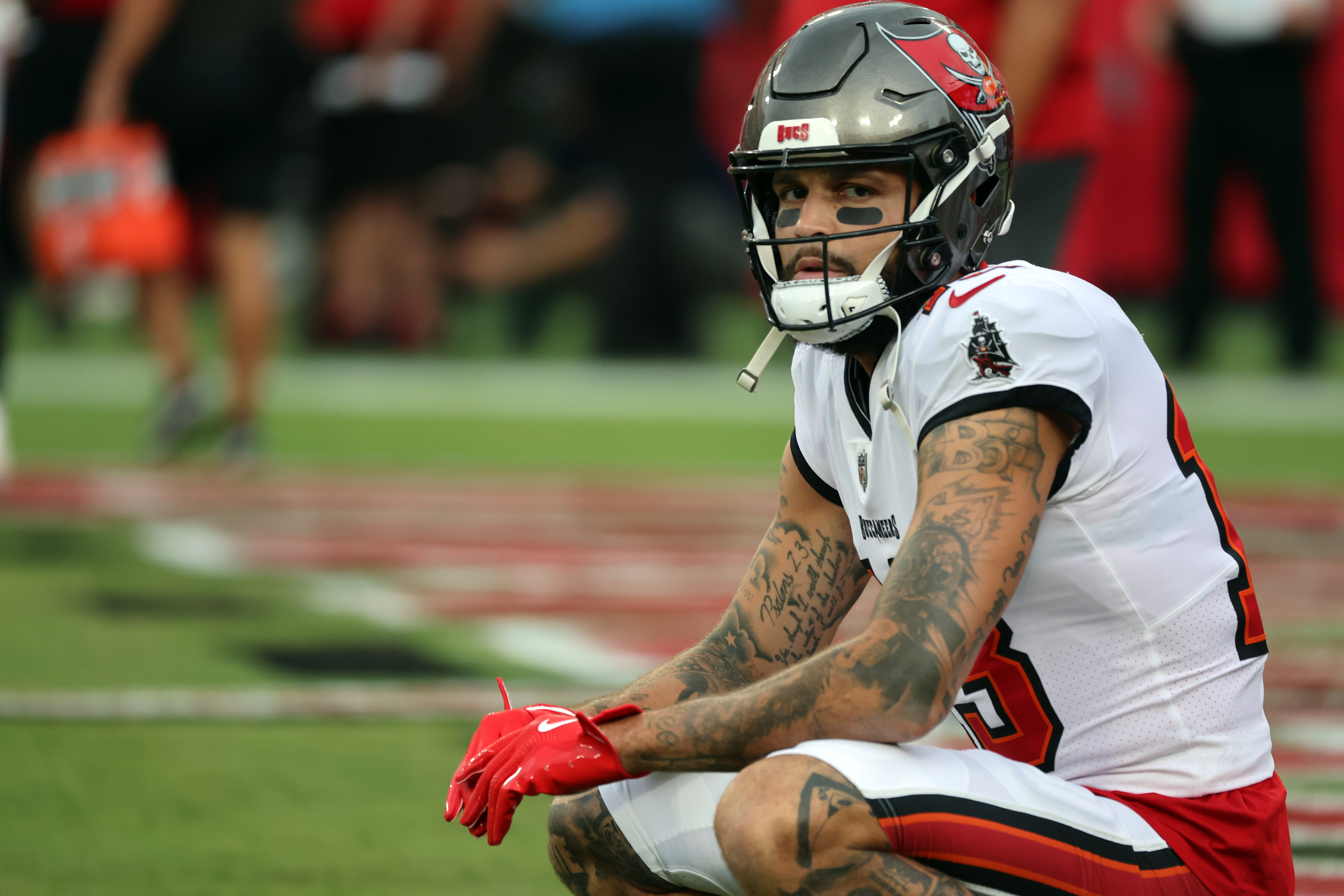 Aug 23, 2024; Tampa, Florida, USA; Tampa Bay Buccaneers wide receiver Mike Evans (13) looks on before the game against the Miami Dolphins at Raymond James Stadium. Mandatory