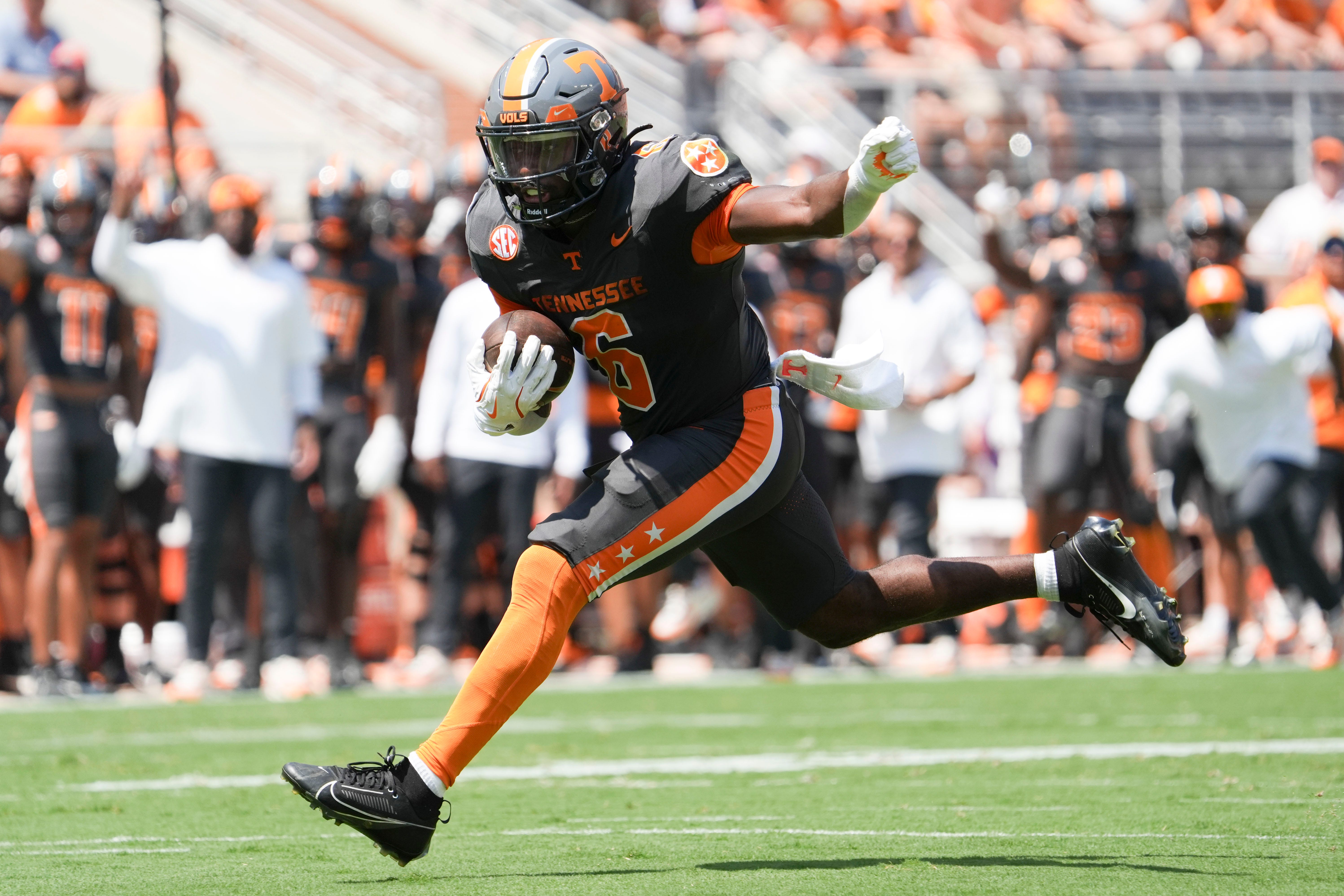 Tennessee running back Dylan Sampson (6) runs with the ball during a game between Tennessee and Chattanooga, Saturday, Aug. 31, 2024.