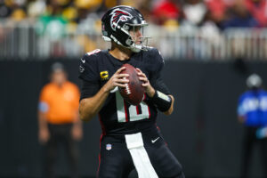 Sep 8, 2024; Atlanta, Georgia, USA; Atlanta Falcons quarterback Kirk Cousins (18) drops back to pass against the Pittsburgh Steelers in the second quarter at Mercedes-Benz Stadium.