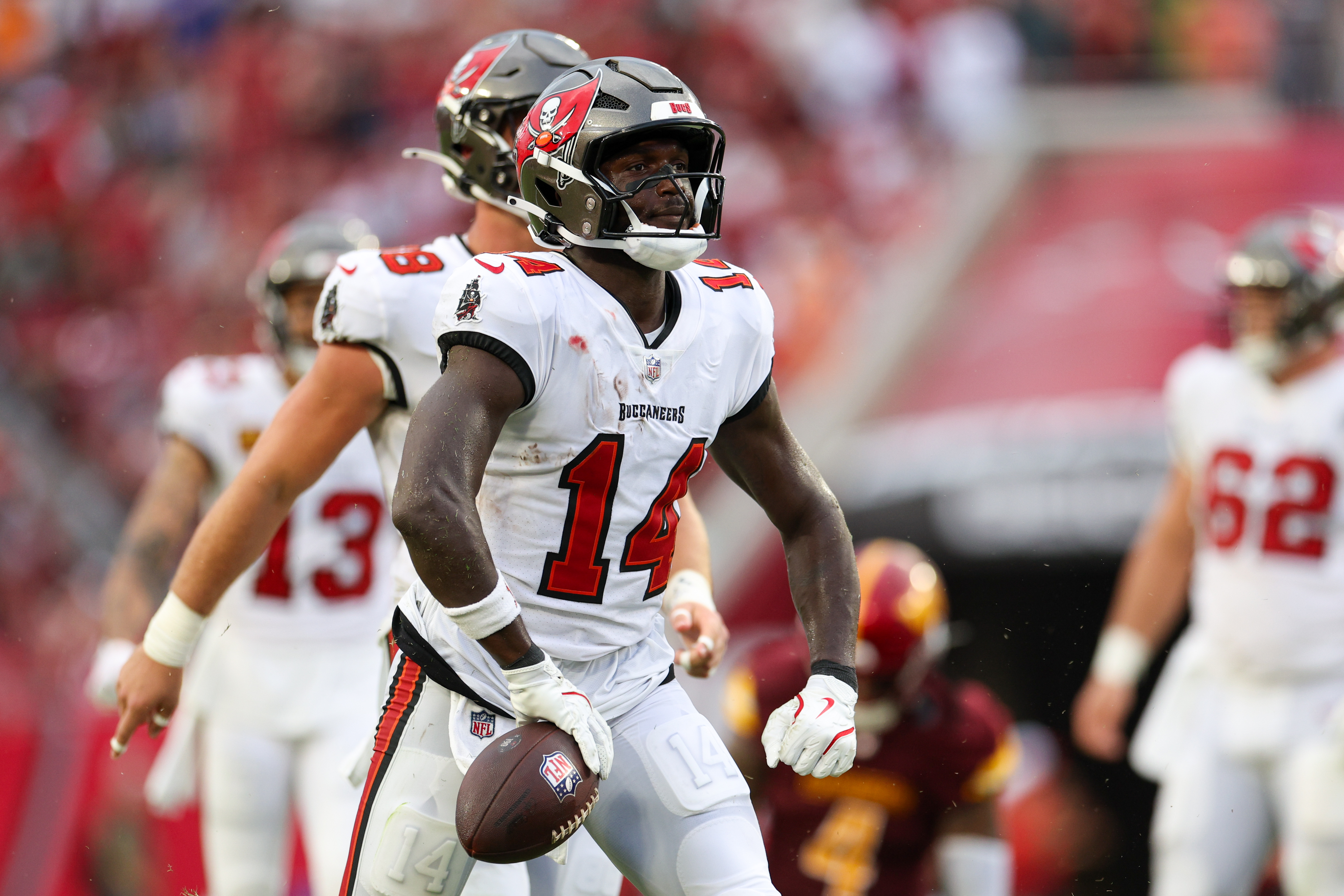 Sep 8, 2024; Tampa, Florida, USA; Tampa Bay Buccaneers wide receiver Chris Godwin (14) reacts after a play against the Washington Commanders in the fourth quarter at Raymond James Stadium.