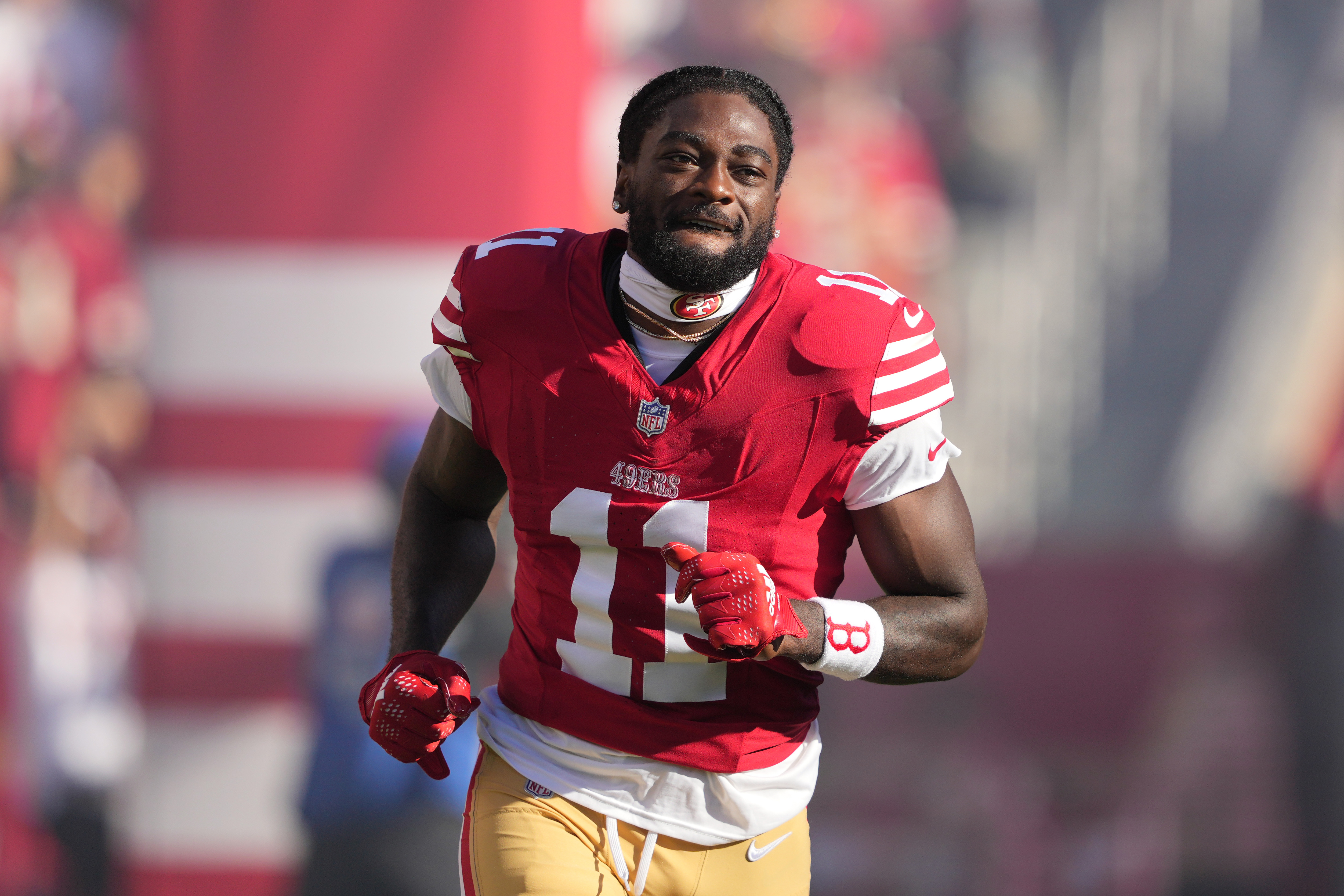 Sep 9, 2024; Santa Clara, California, USA; San Francisco 49ers wide receiver Brandon Aiyuk (11) is introduced to the crowd before the game against the New York Jets at Levi's Stadium.