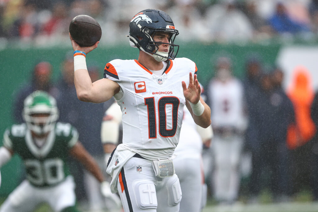 Sep 29, 2024; East Rutherford, New Jersey, USA; Denver Broncos quarterback Bo Nix (10) throws the ball during the first half against the New York Jets at MetLife Stadium.