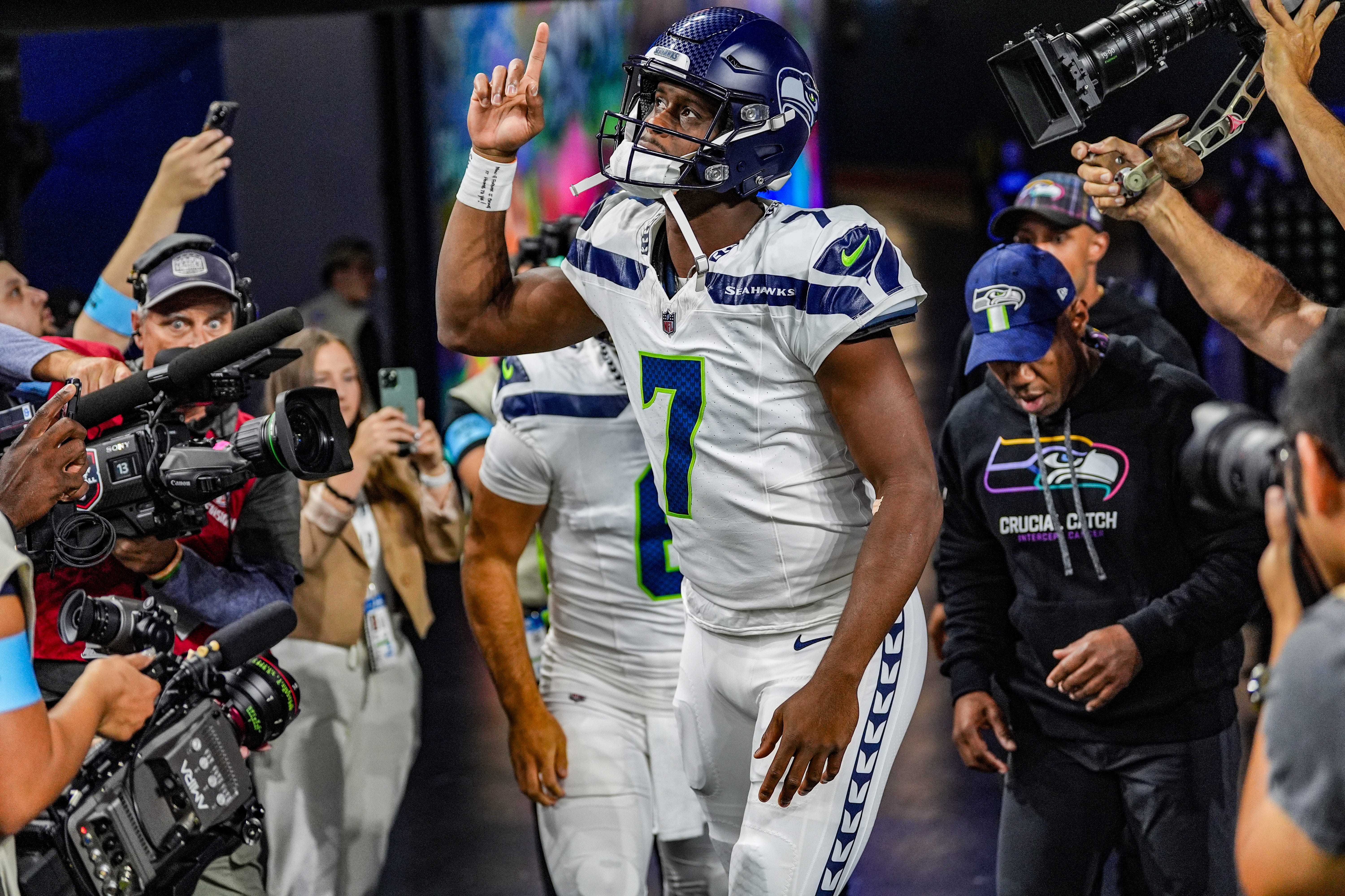 Seattle Seahawks quarterback Geno Smith (7) runs out onto the field during the pregame for the N.F.L. game between the Detroit Lions and the Seattle Seahawks at Ford Field in Detroit, Monday, Sept. 30, 2024.