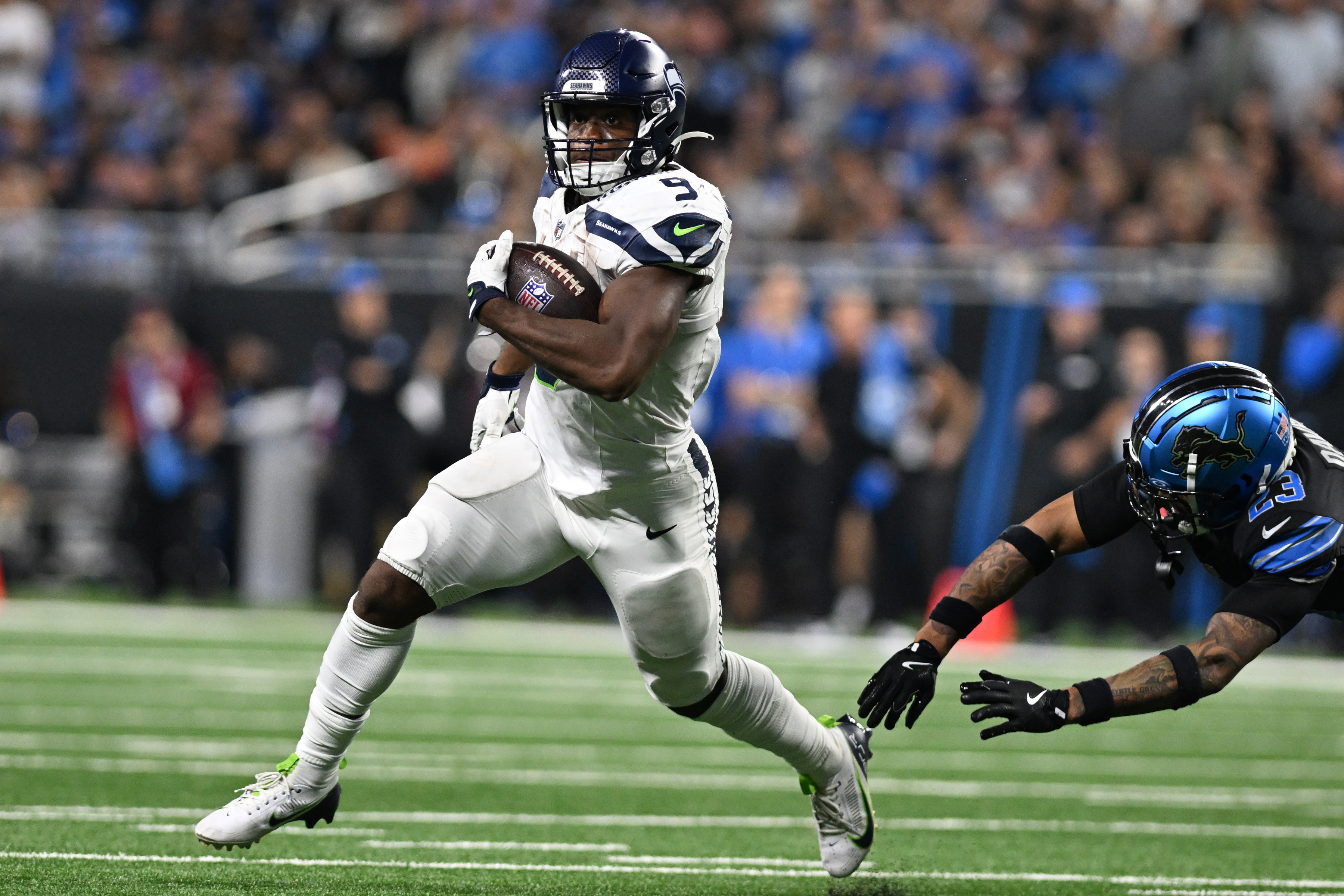 Sep 30, 2024; Detroit, Michigan, USA; Seattle Seahawks running back Kenneth Walker III (9) runs the ball against the Detroit Lions in the fourth quarter at Ford Field.