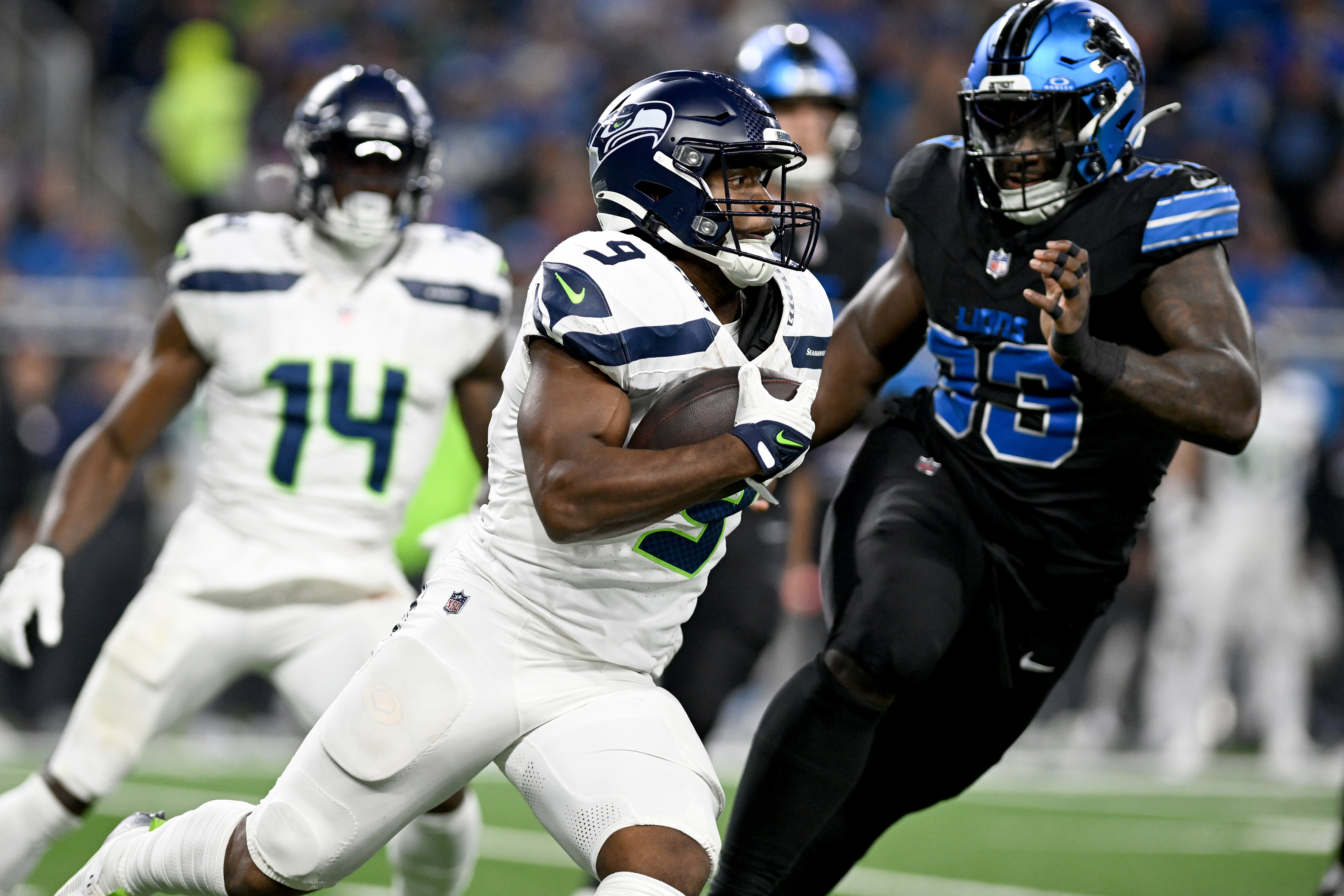 Sep 30, 2024; Detroit, Michigan, USA; Seattle Seahawks running back Kenneth Walker III (9) runs the ball against the Detroit Lions in the fourth quarter at Ford Field.