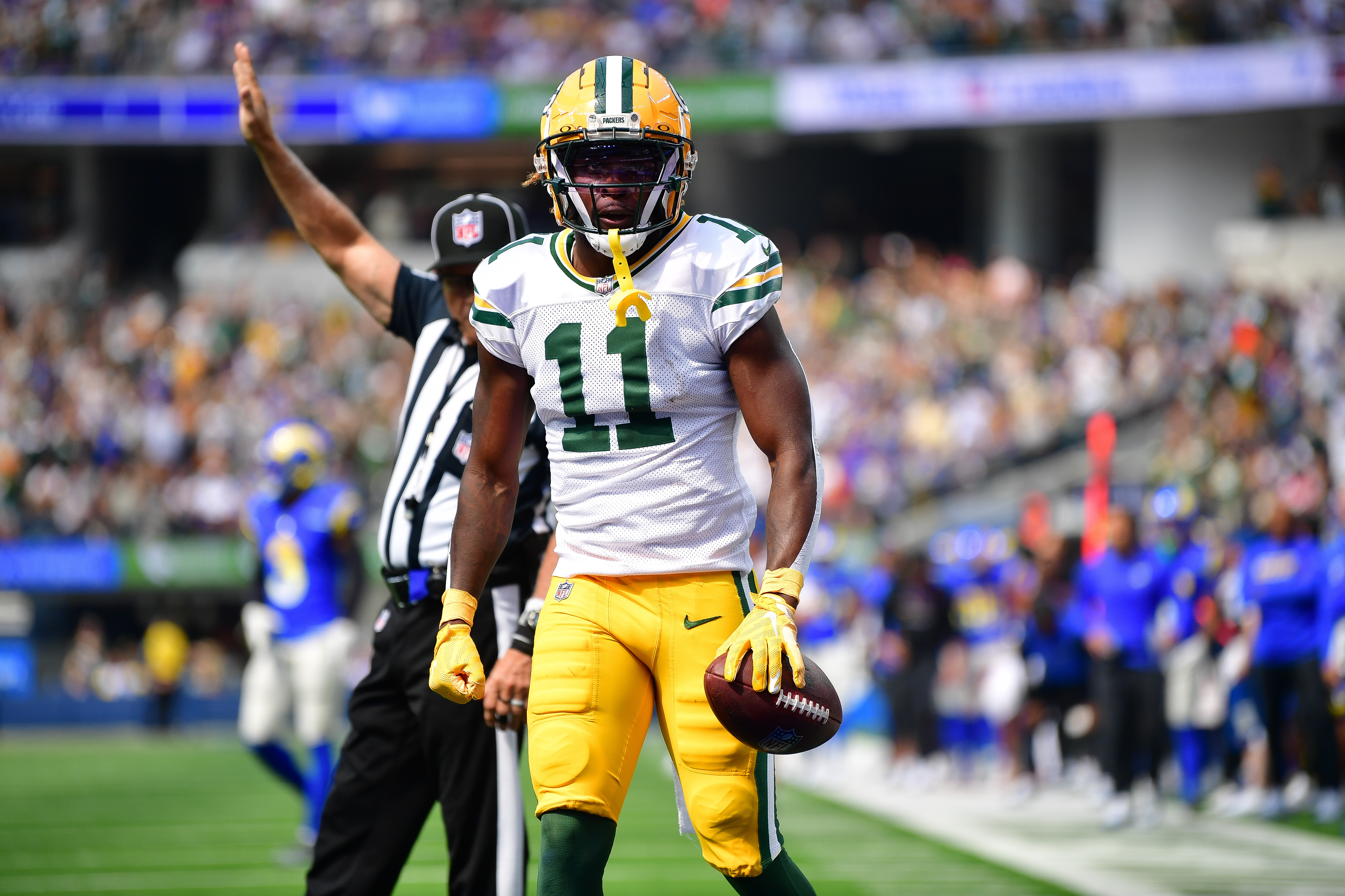 Oct 6, 2024; Inglewood, California, USA; Green Bay Packers wide receiver Jayden Reed (11) reacts after catching a pass against the Los Angeles Rams during the first half at SoFi Stadium.