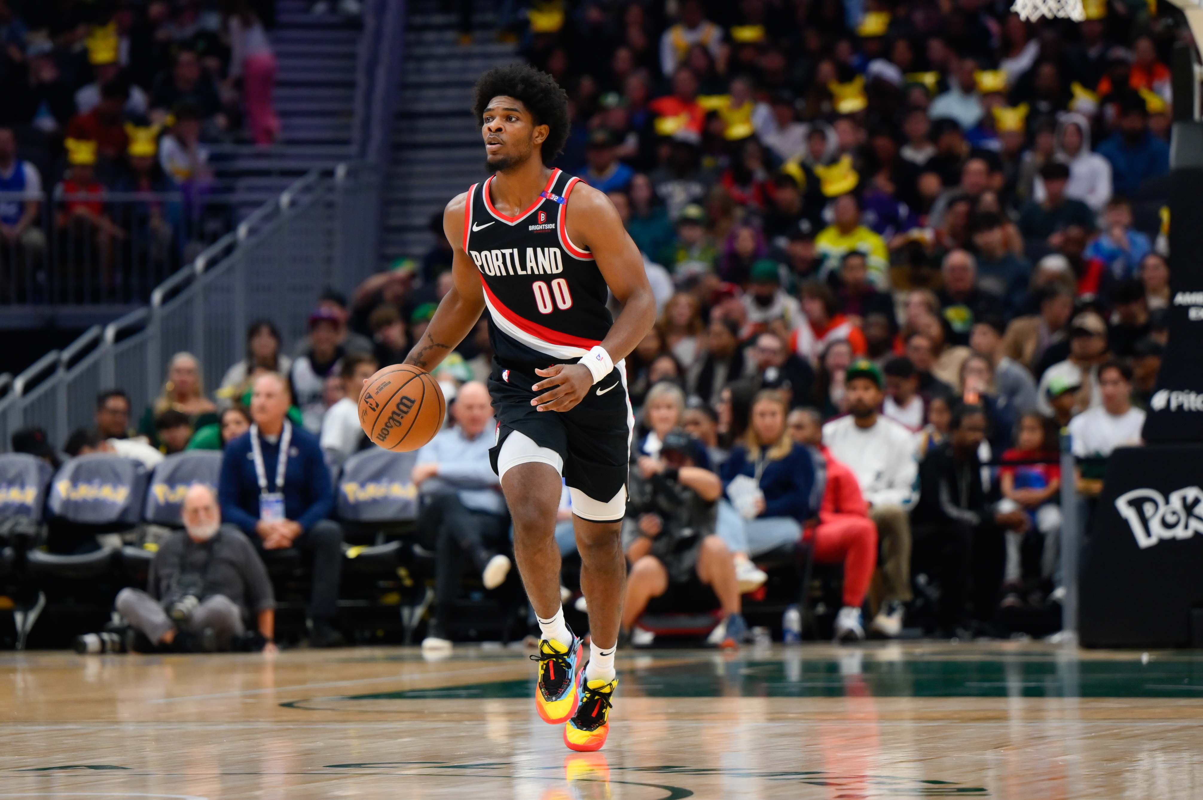 Oct 11, 2024; Seattle, Washington, USA; Portland Trail Blazers guard Scoot Henderson (00) dribbles the ball during the second half at Climate Pledge Arena.