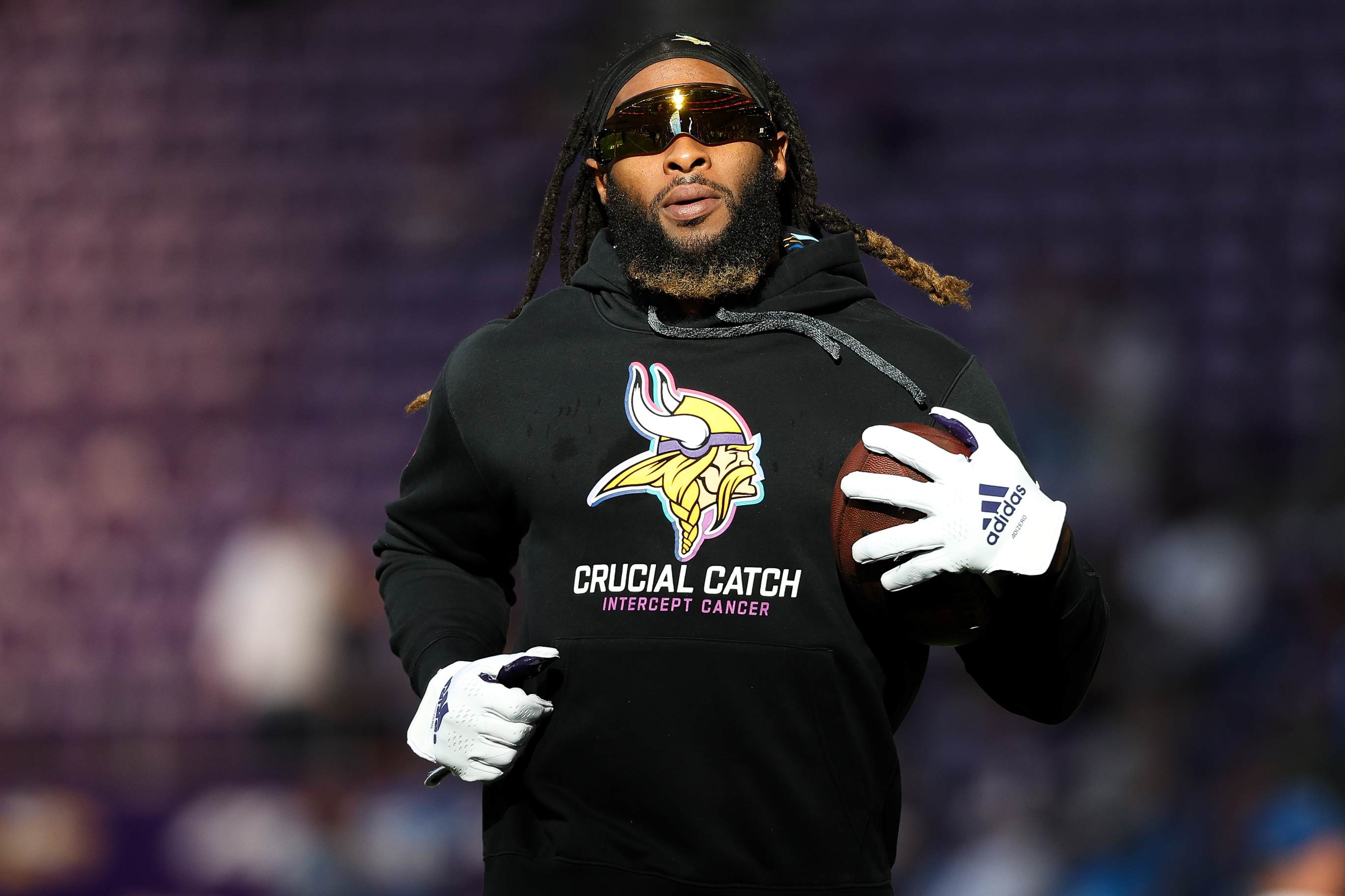 Oct 20, 2024; Minneapolis, Minnesota, USA; Minnesota Vikings running back Aaron Jones (33) warms up before the game against the Detroit Lions at U.S. Bank Stadium.