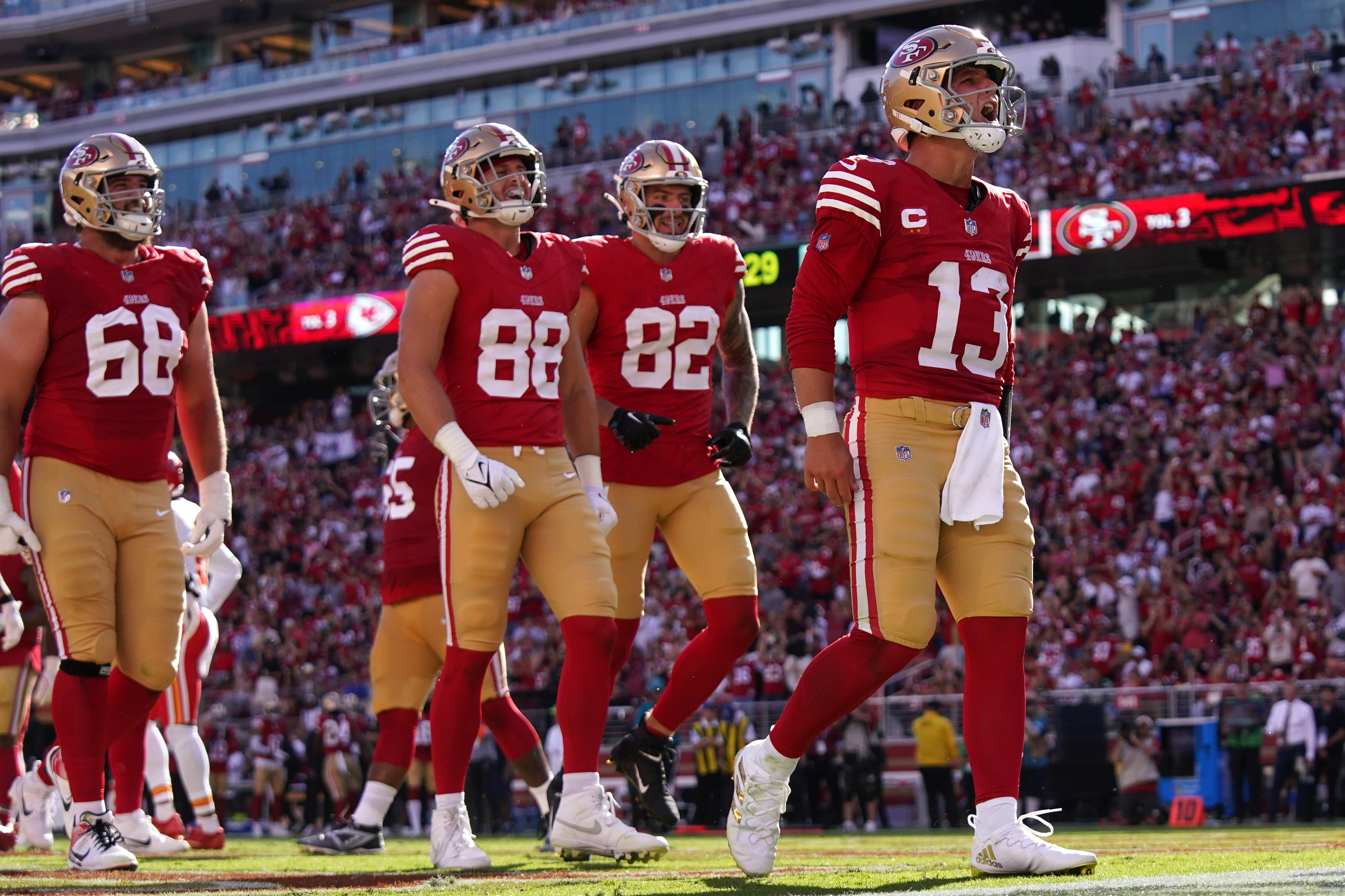 Oct 20, 2024; Santa Clara, California, USA; San Francisco 49ers quarterback Brock Purdy (13) reacts after rushing for a touchdown against the Kansas City Chiefs in the third quarter at Levi's Stadium.