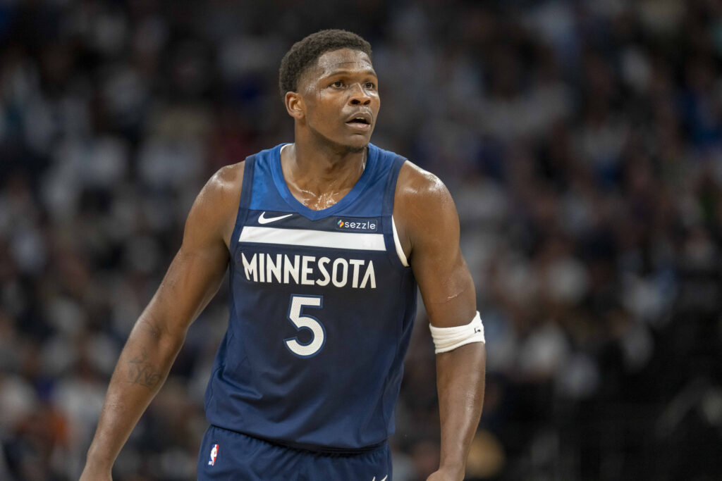 Oct 26, 2024; Minneapolis, Minnesota, USA; Minnesota Timberwolves guard Anthony Edwards (5) looks on against the Toronto Raptors in the first half at Target Center.