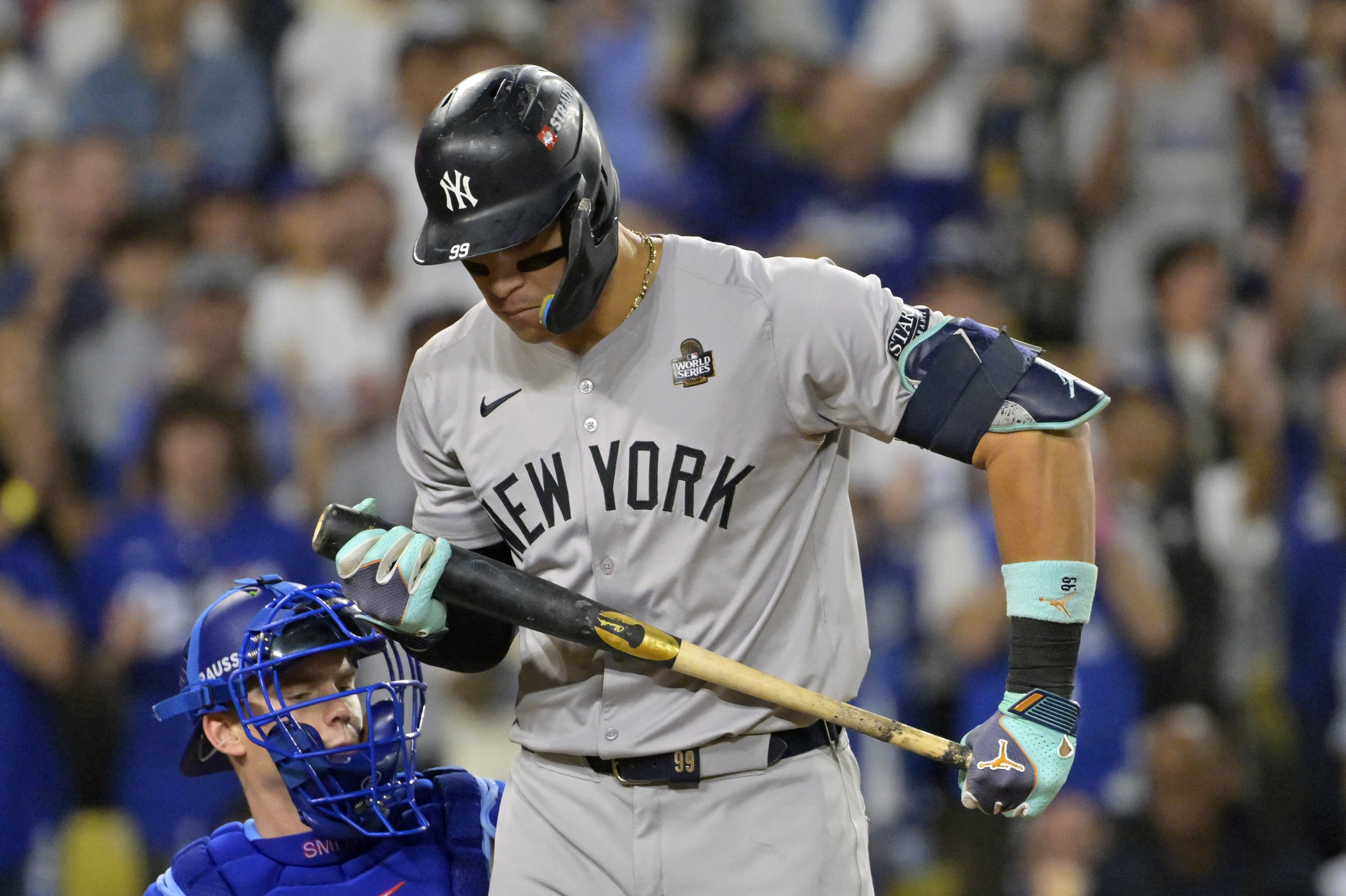 Oct 26, 2024; Los Angeles, California, USA; New York Yankees outfielder Aaron Judge (99) reacts after striking out in the ninth inning during game two of the 2024 MLB World Series at Dodger Stadium.