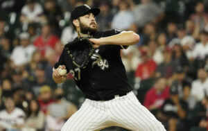 Chicago White Sox pitcher Lucas Giolito winds up to throw a pitch