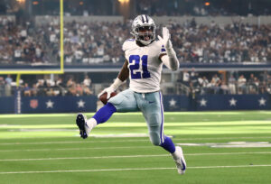 Dallas Cowboys running back Ezikiel Elliott struts into the end zone on a touchdown run